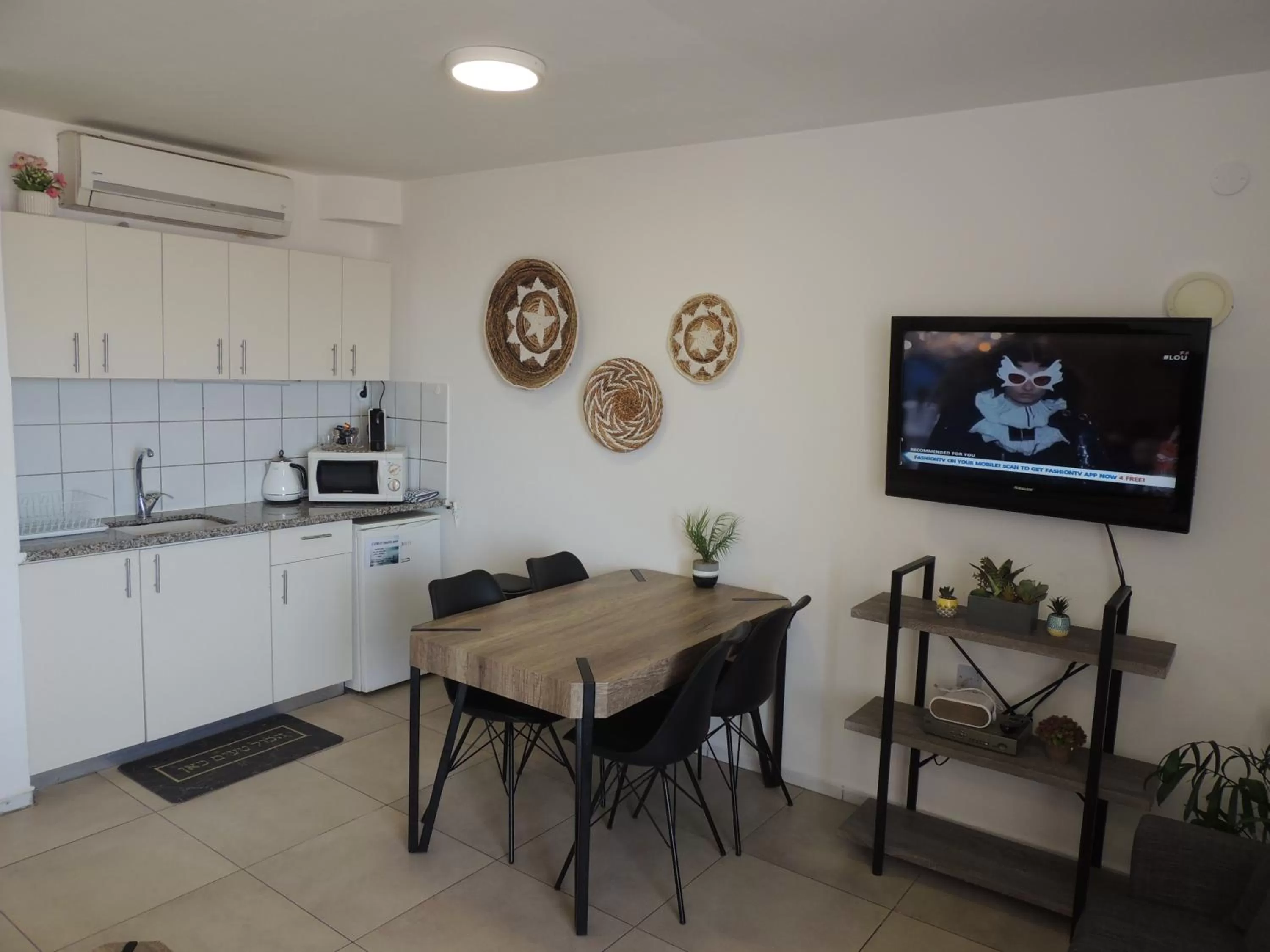 TV and multimedia, Dining Area in Lev Eilat Suites