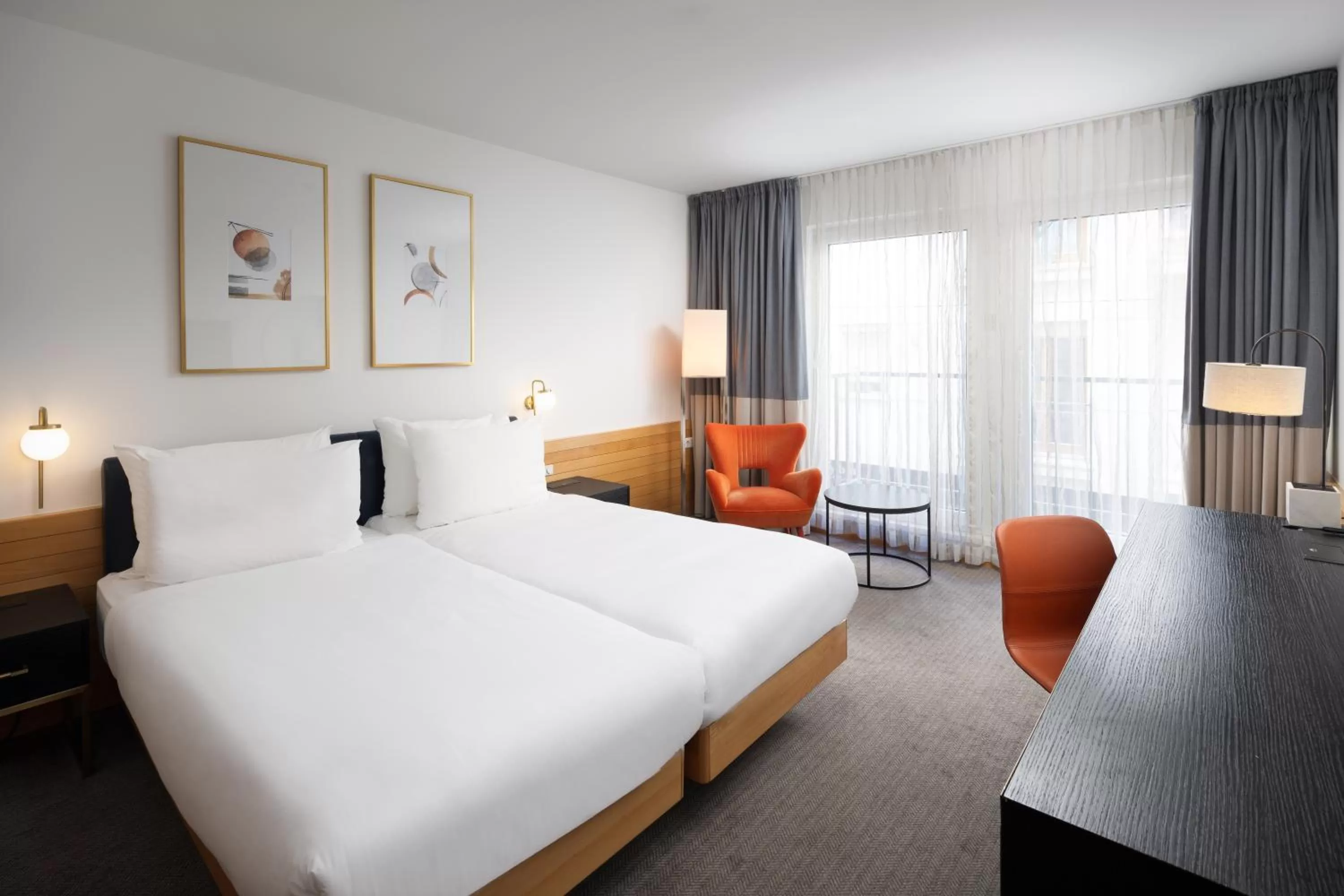 Bed in K+K Hotel Opera