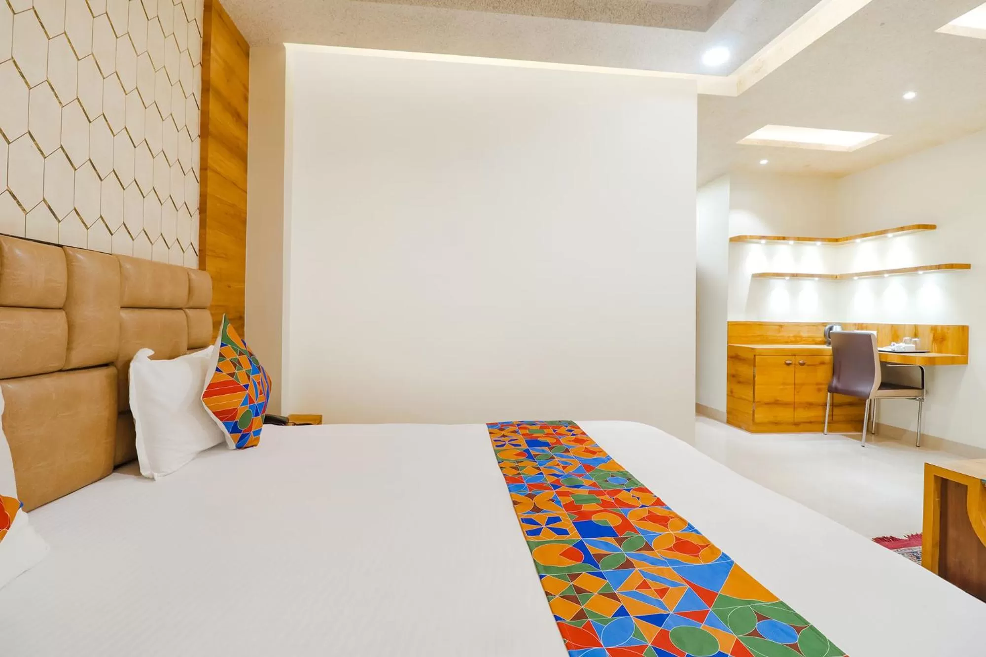 Bed in FabHotel Holiday Grand