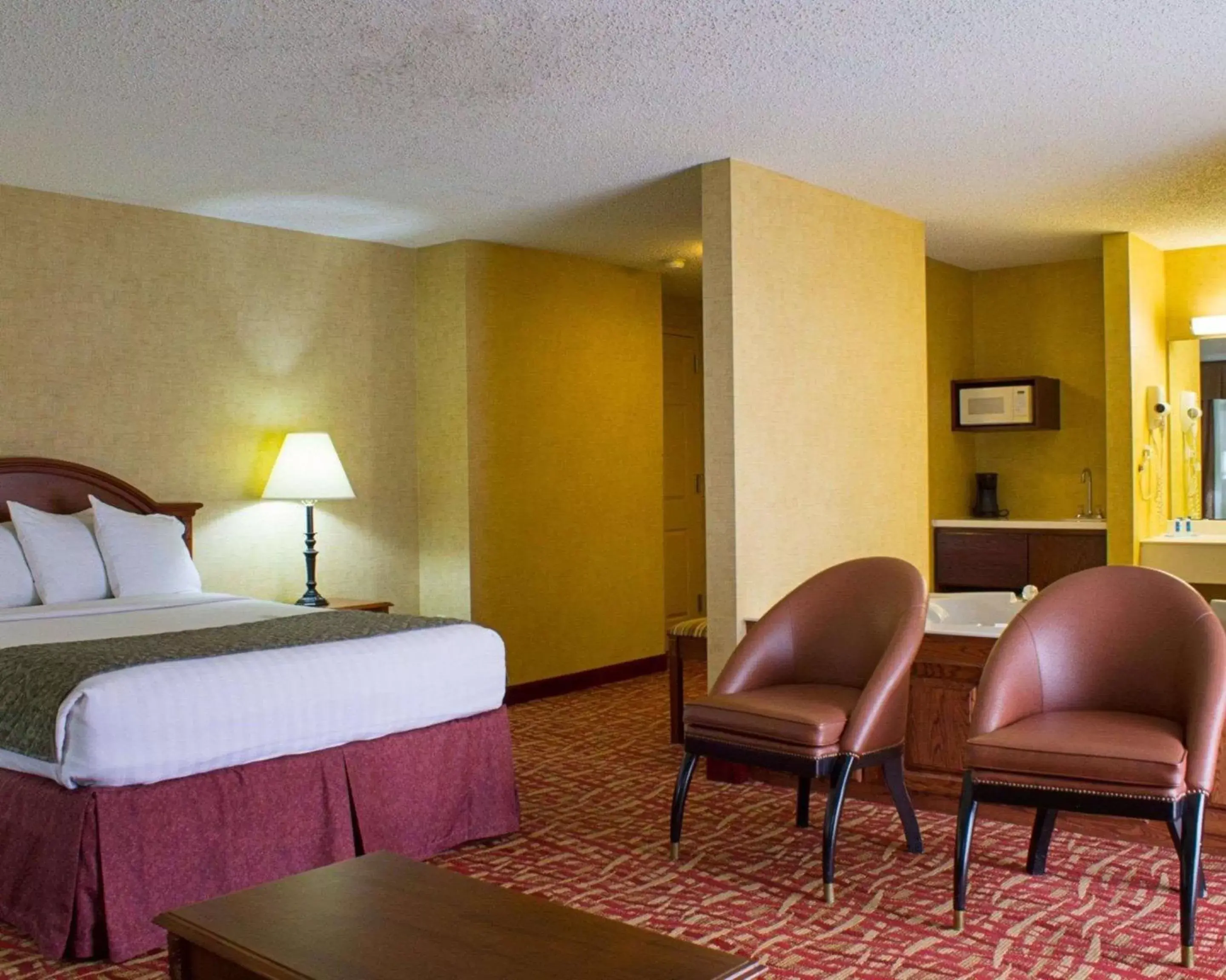 Photo of the whole room, Bed in Rodeway Inn Columbia Mall Loop