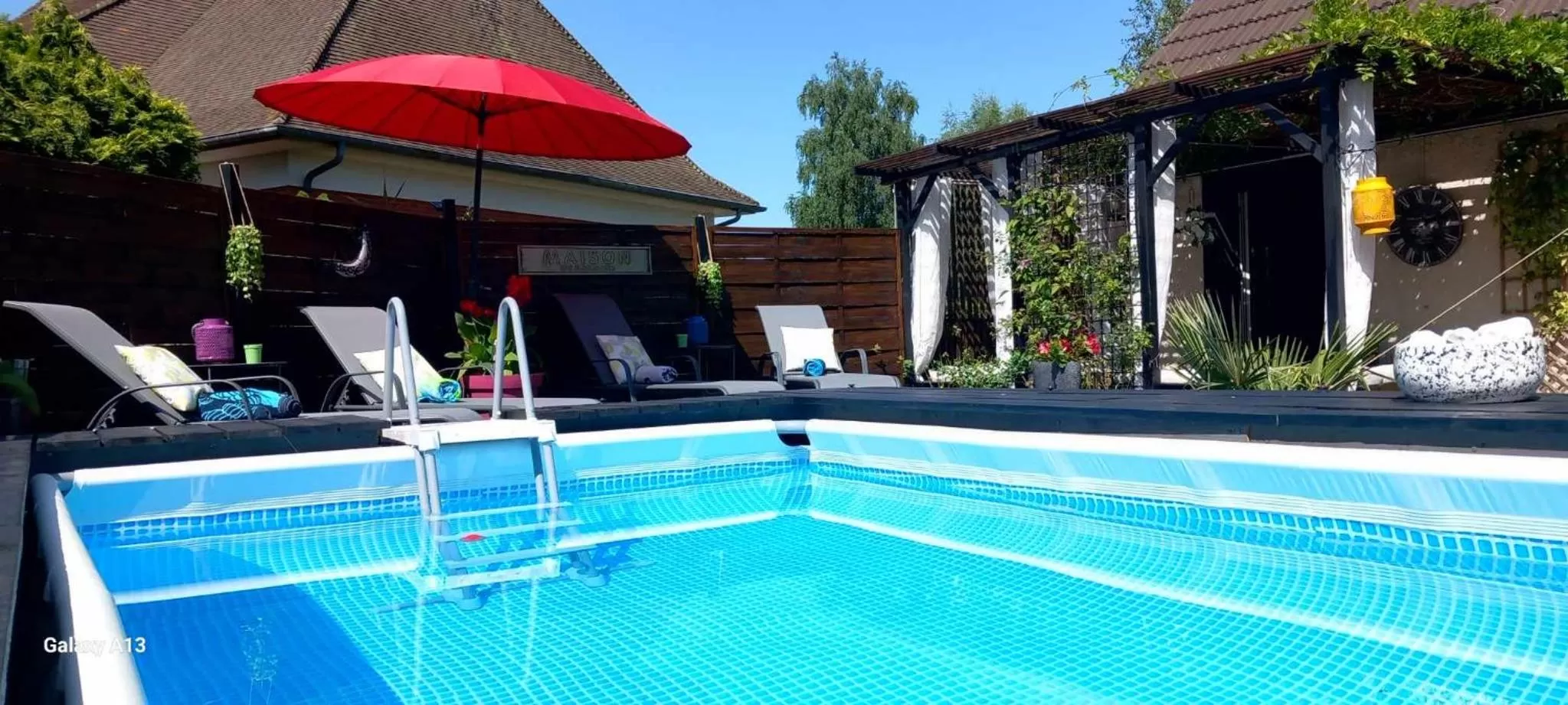 Swimming pool in Les Epinettes chambres d'hôtes