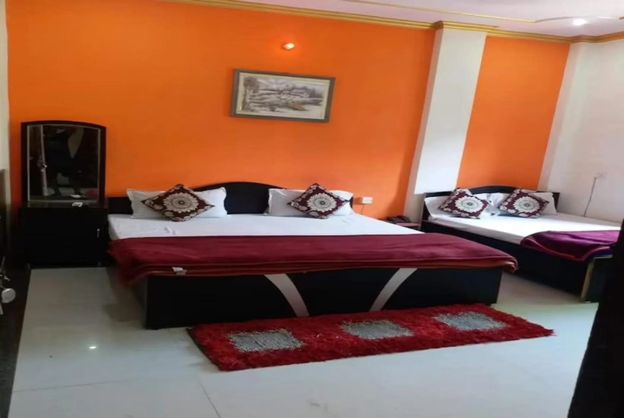 Bed in Goroomgo New Ashiyana Palace Varanasi