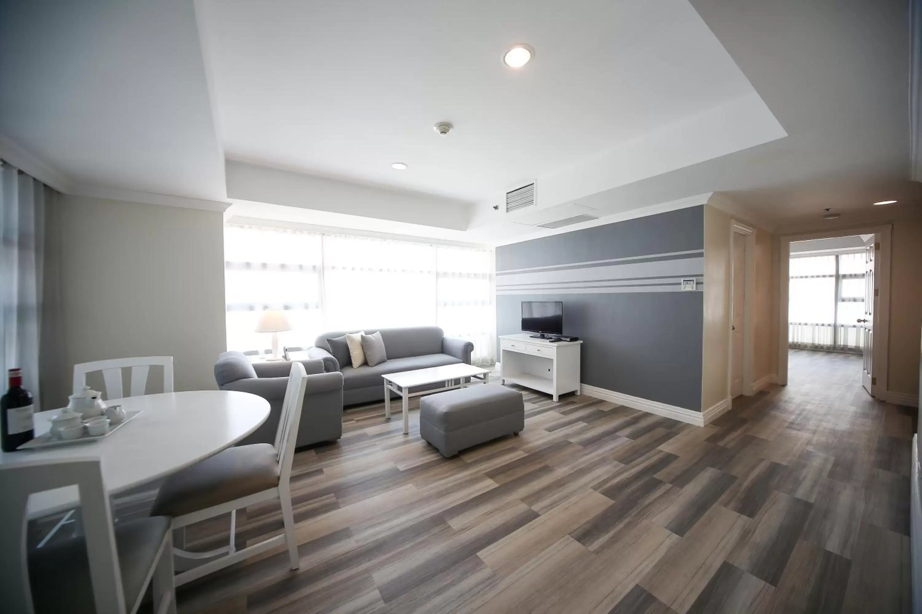 Living room, Dining Area in Infinity Tower Suites