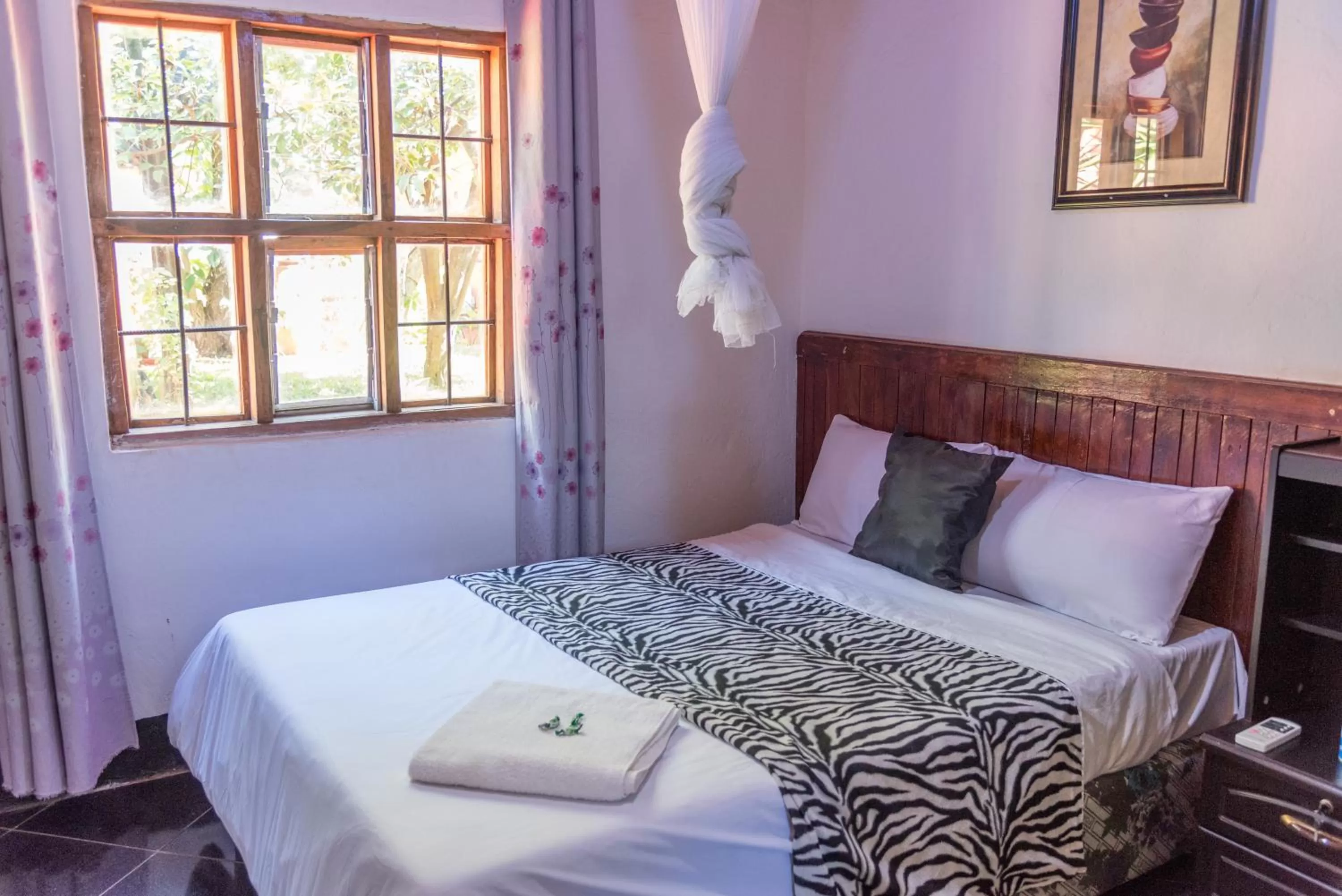 Photo of the whole room, Bed in Okavango Lodge