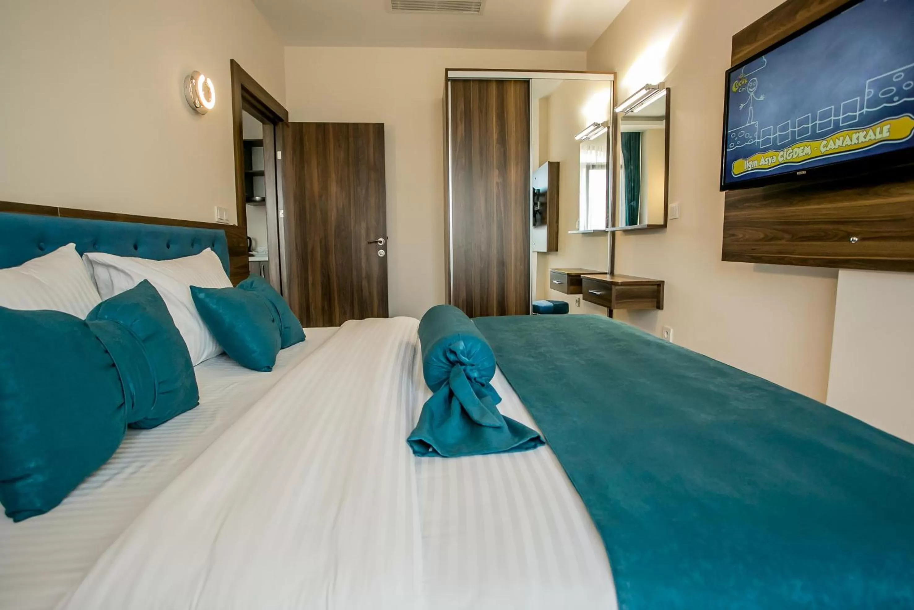 Communal lounge/ TV room, Bed in Beyzas Hotels & Suites