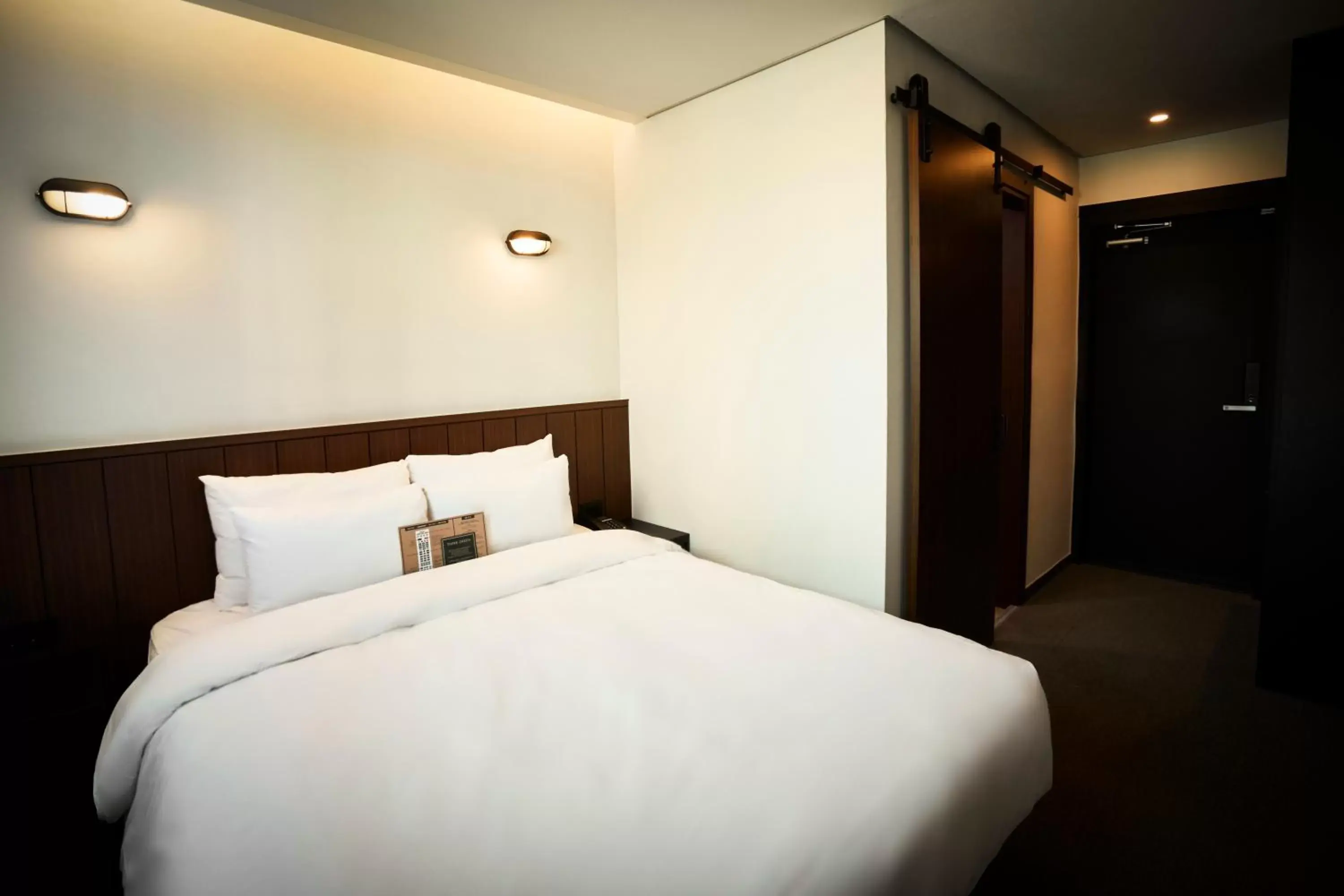 Bed in Hotel Lumia Myeongdong