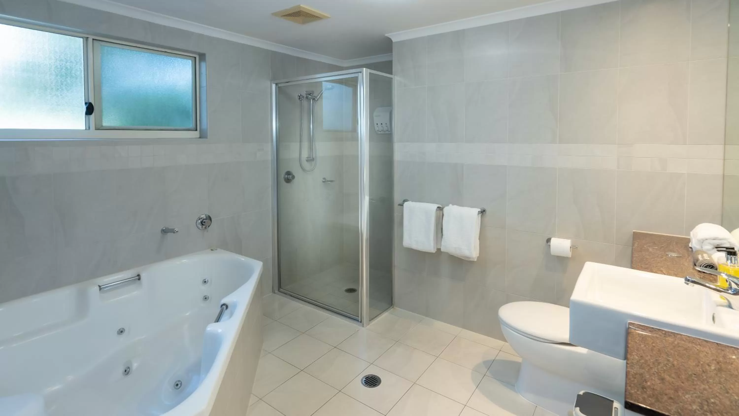 Bathroom in Waters Edge Apartment Cairns