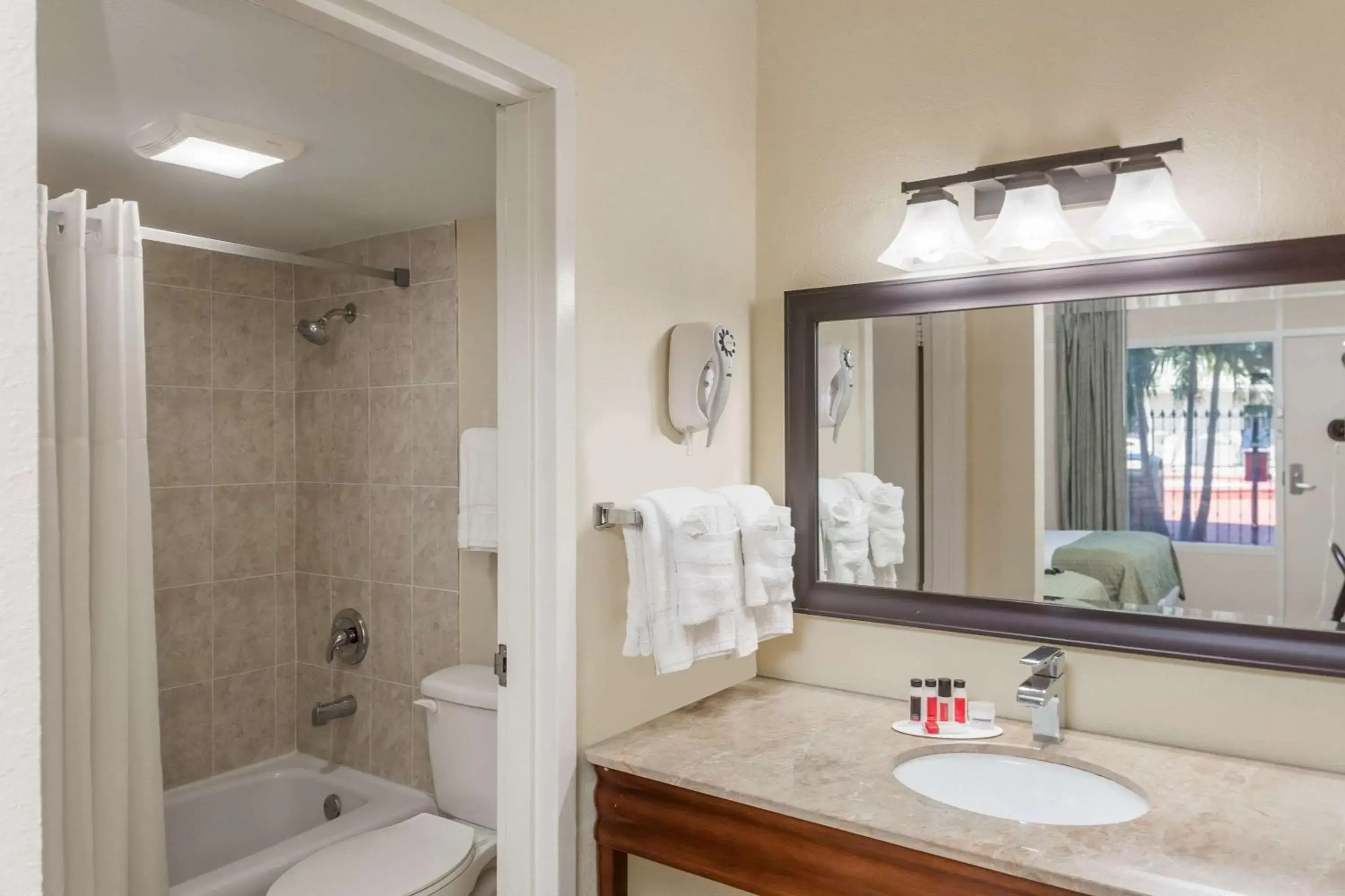 Bathroom in Days Inn by Wyndham St. Petersburg / Tampa Bay Area
