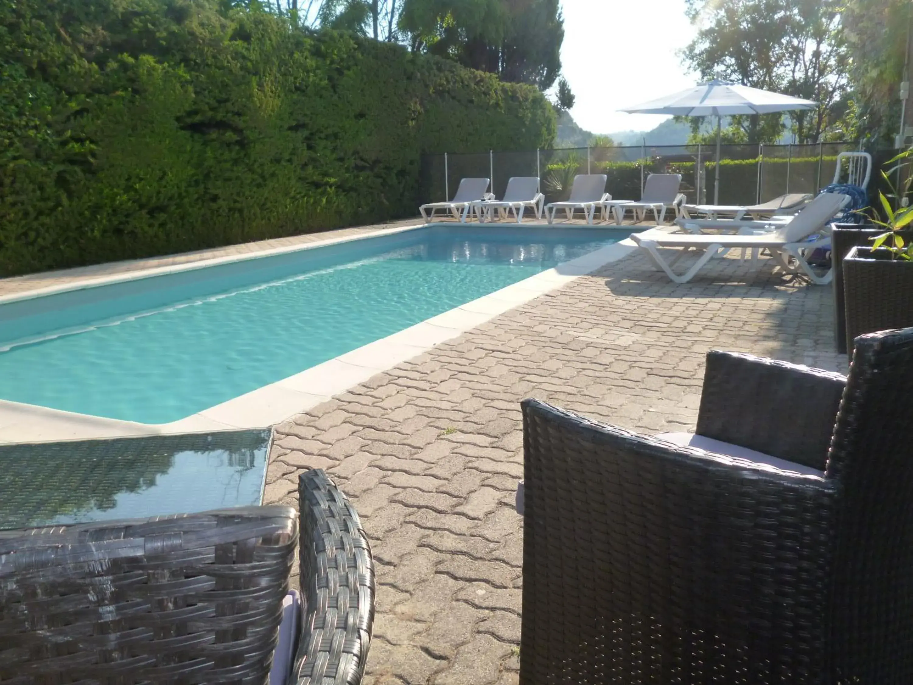 Swimming Pool in Logis Hotel des Cayrons