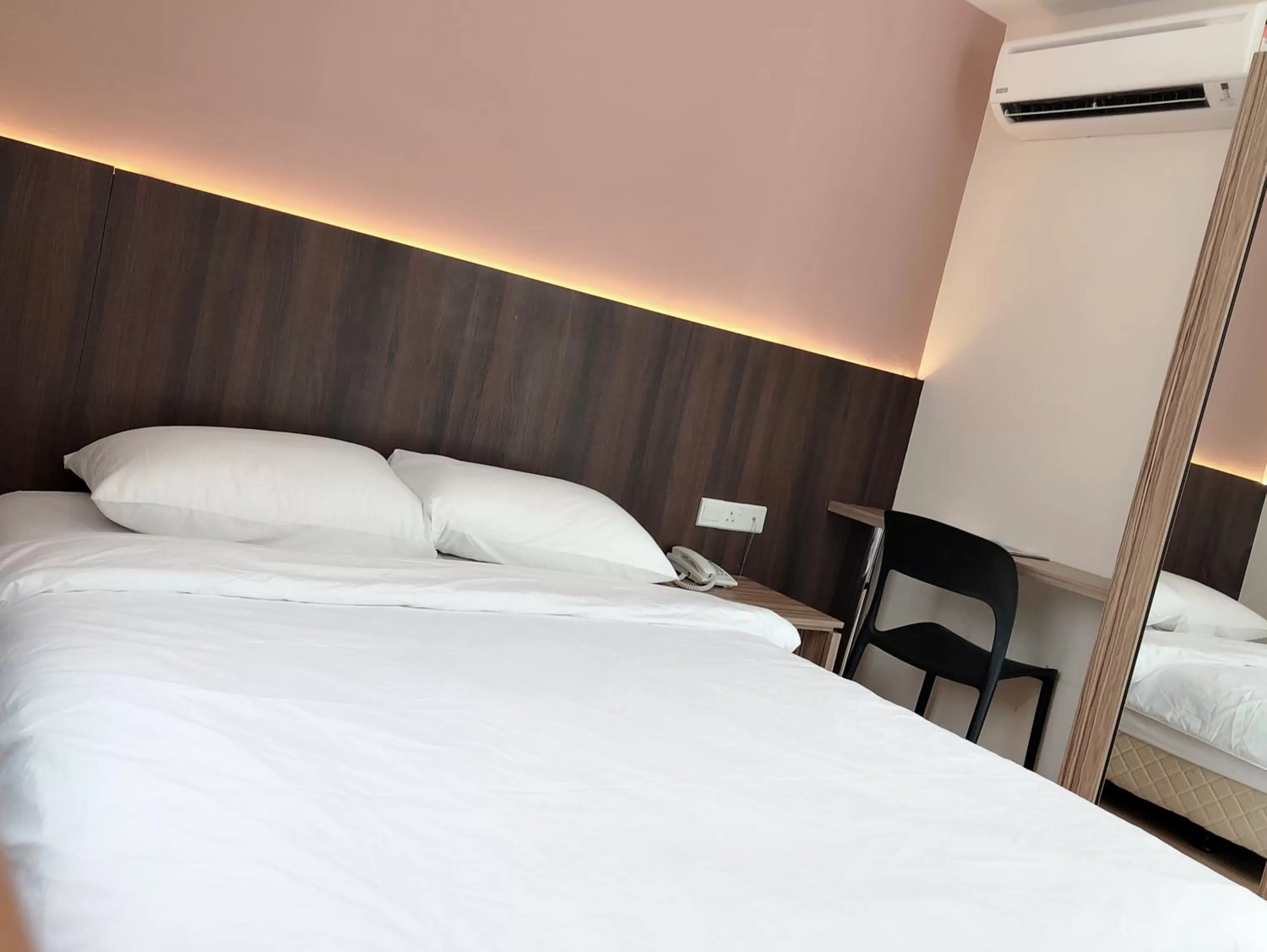 Bed in Tumike Hotel Bentong