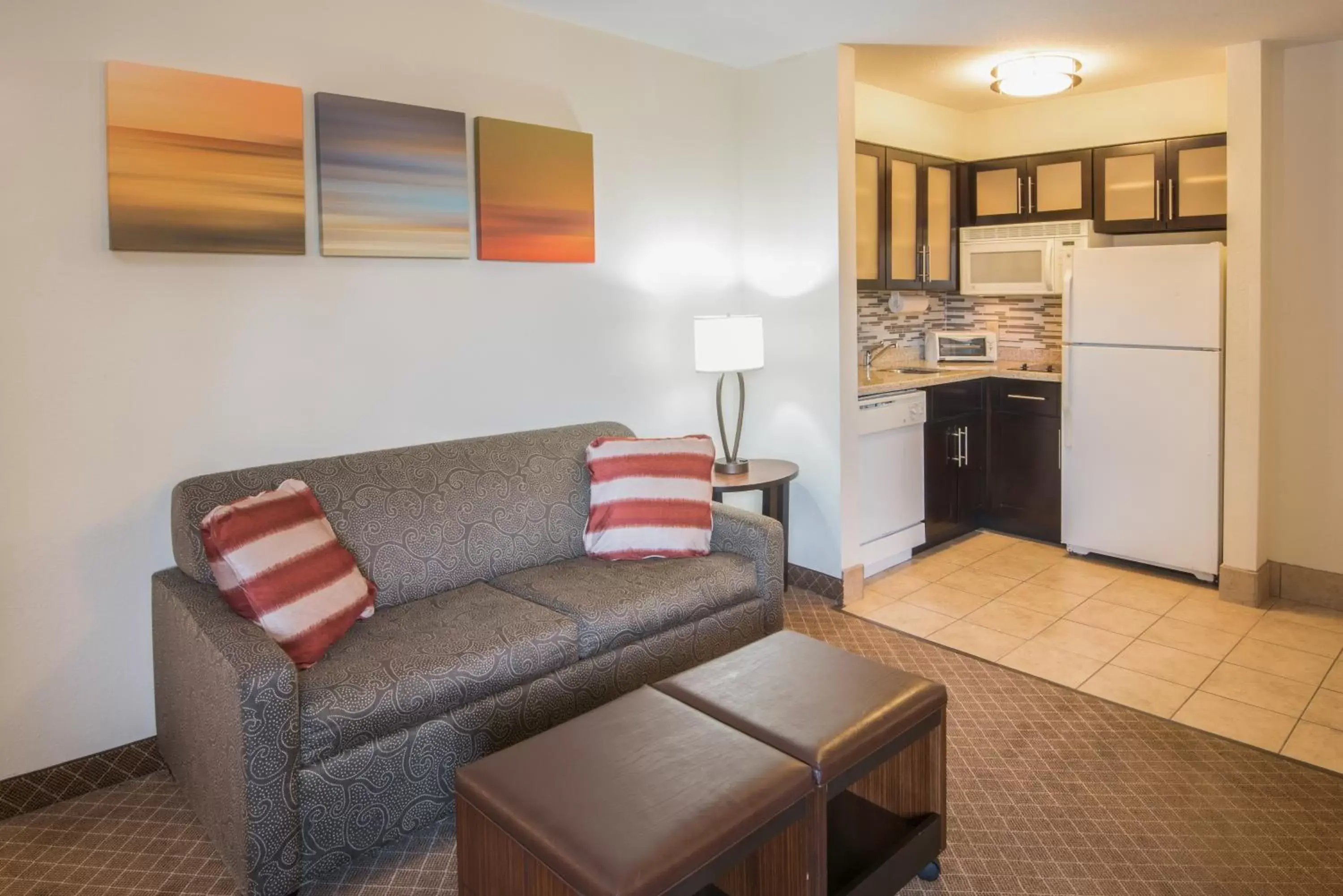 Bedroom, Seating Area in Staybridge Suites Columbus-Airport, an IHG Hotel