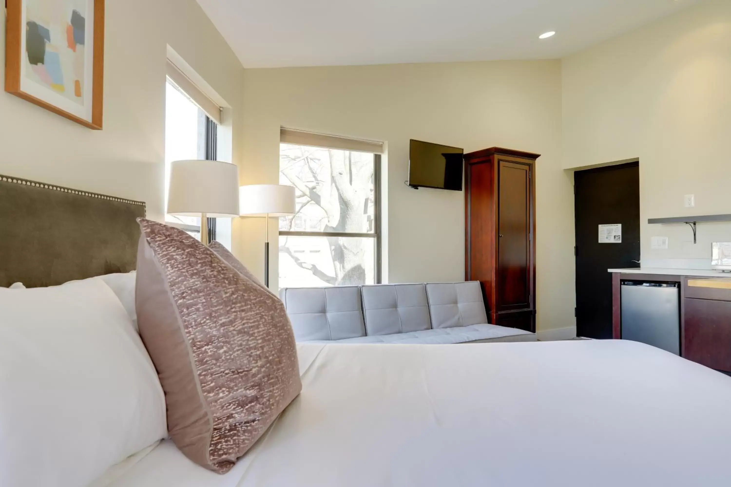 Bed in Sojourn at DuPont Place