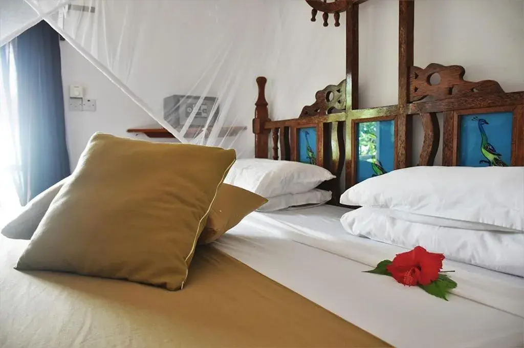Bed in Sea View Lodge Boutique Hotel