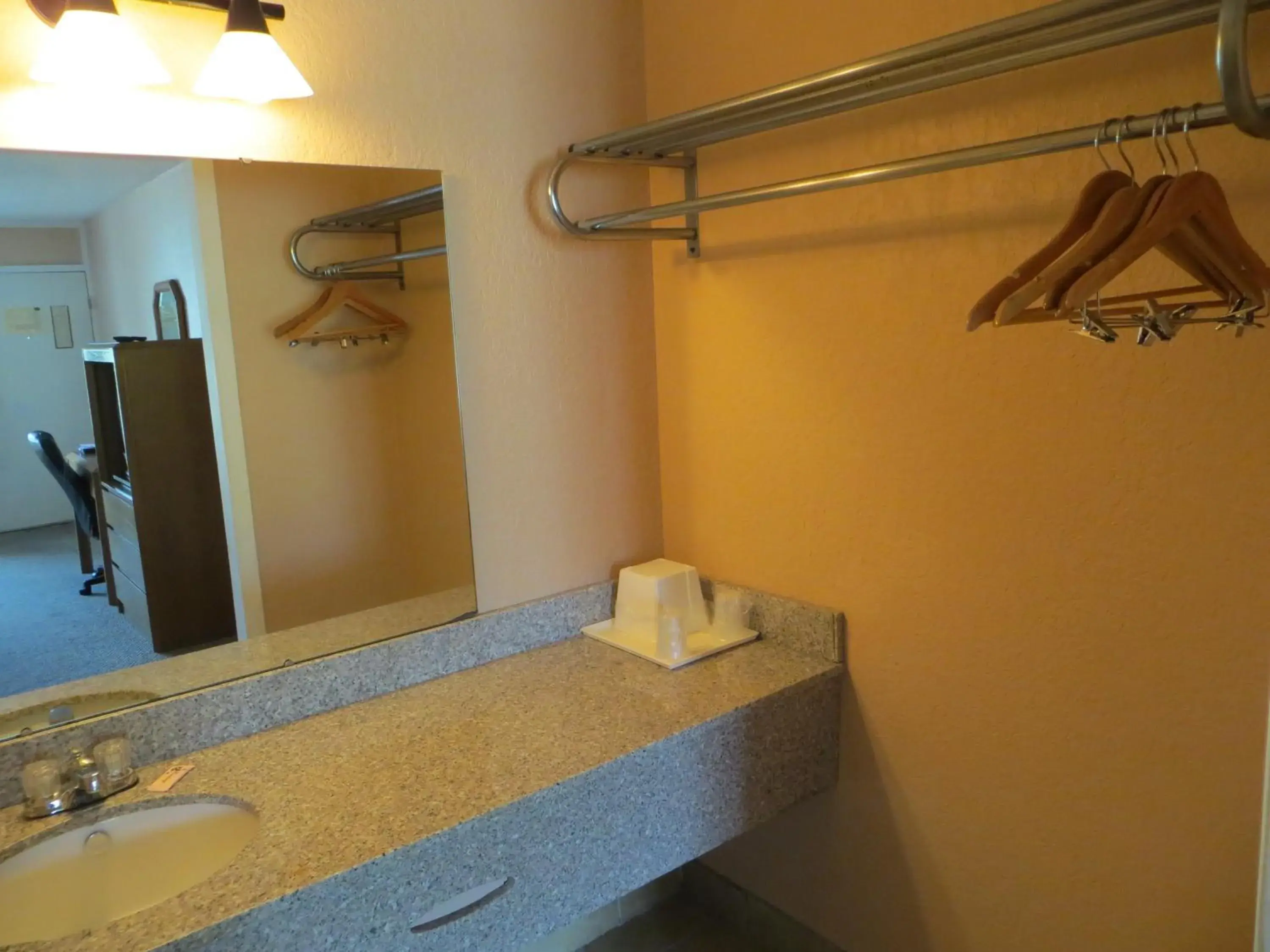 Bathroom in Americourt Extended Stays