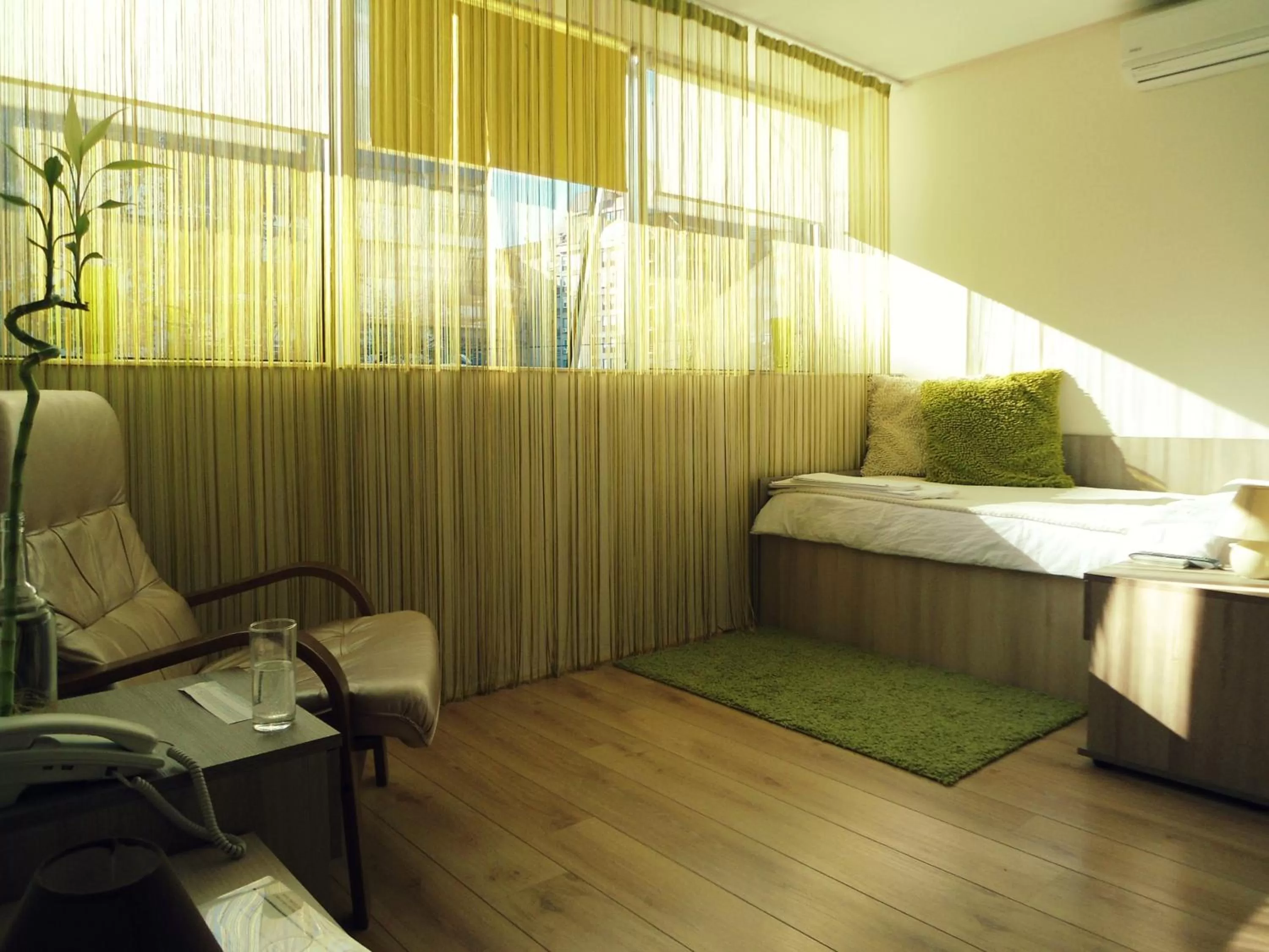 Bed in Garni Hotel Tri O