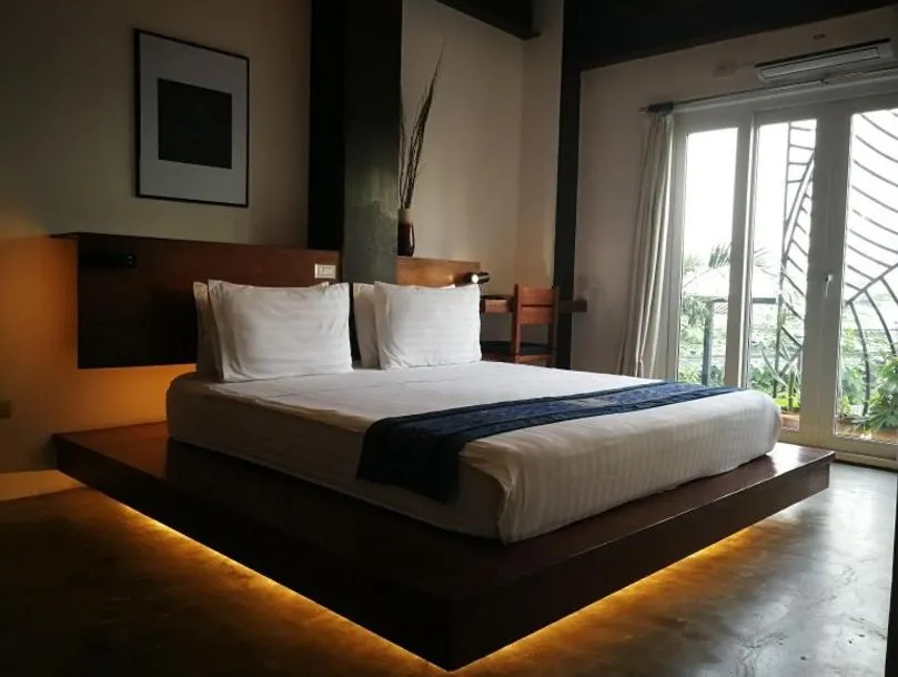 Bed in ELEMENT BOUTIQUE HOTEL