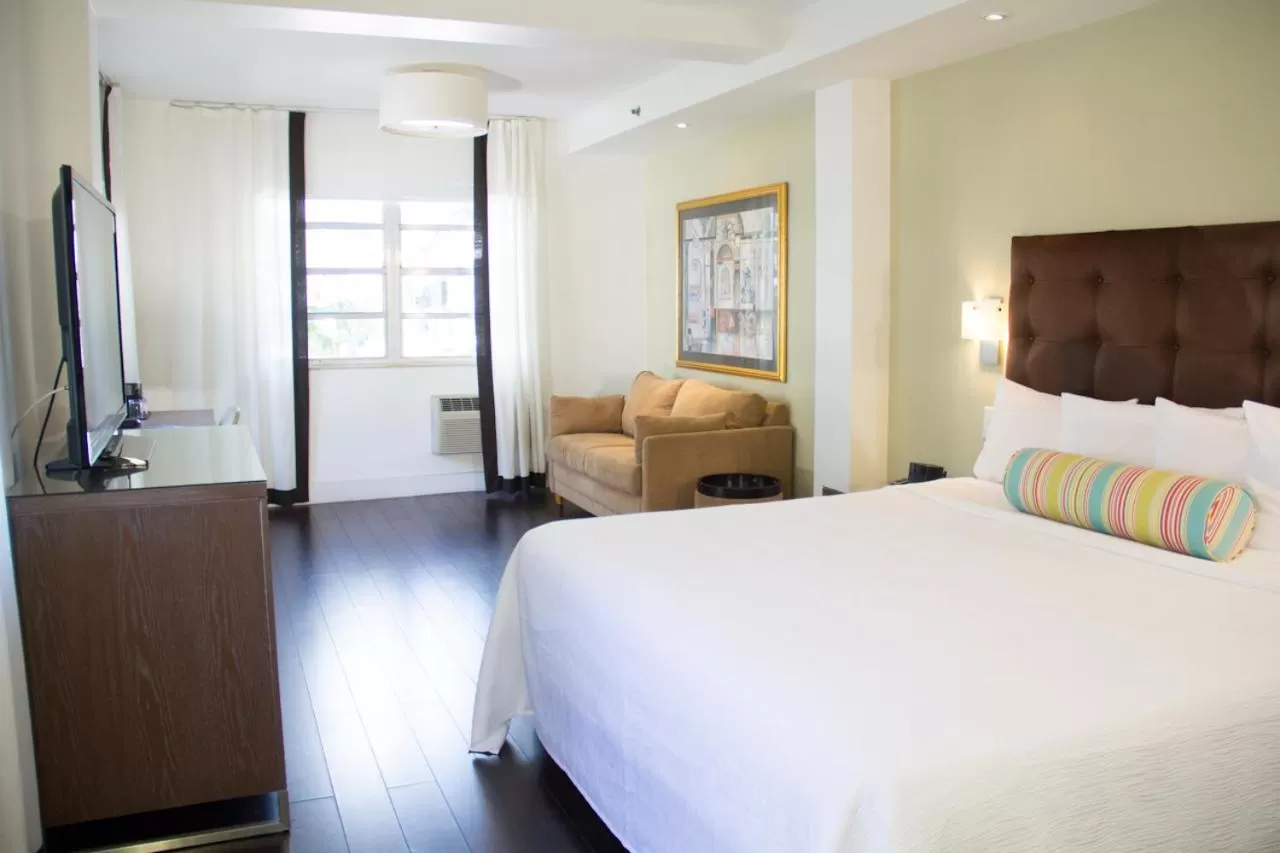 Bed in Dorchester Hotel & Suites