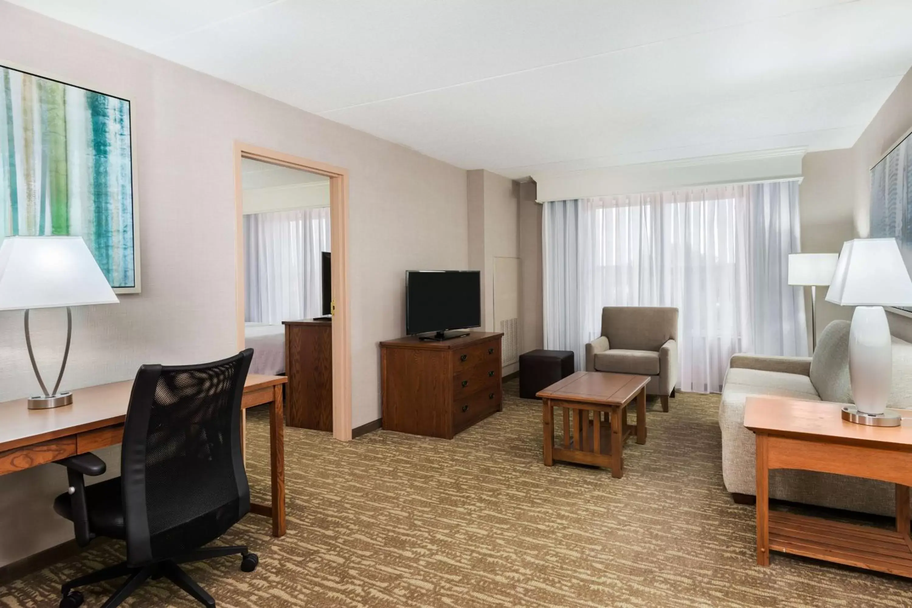 Living room, TV/Entertainment Center in Homewood Suites by Hilton Buffalo-Amherst