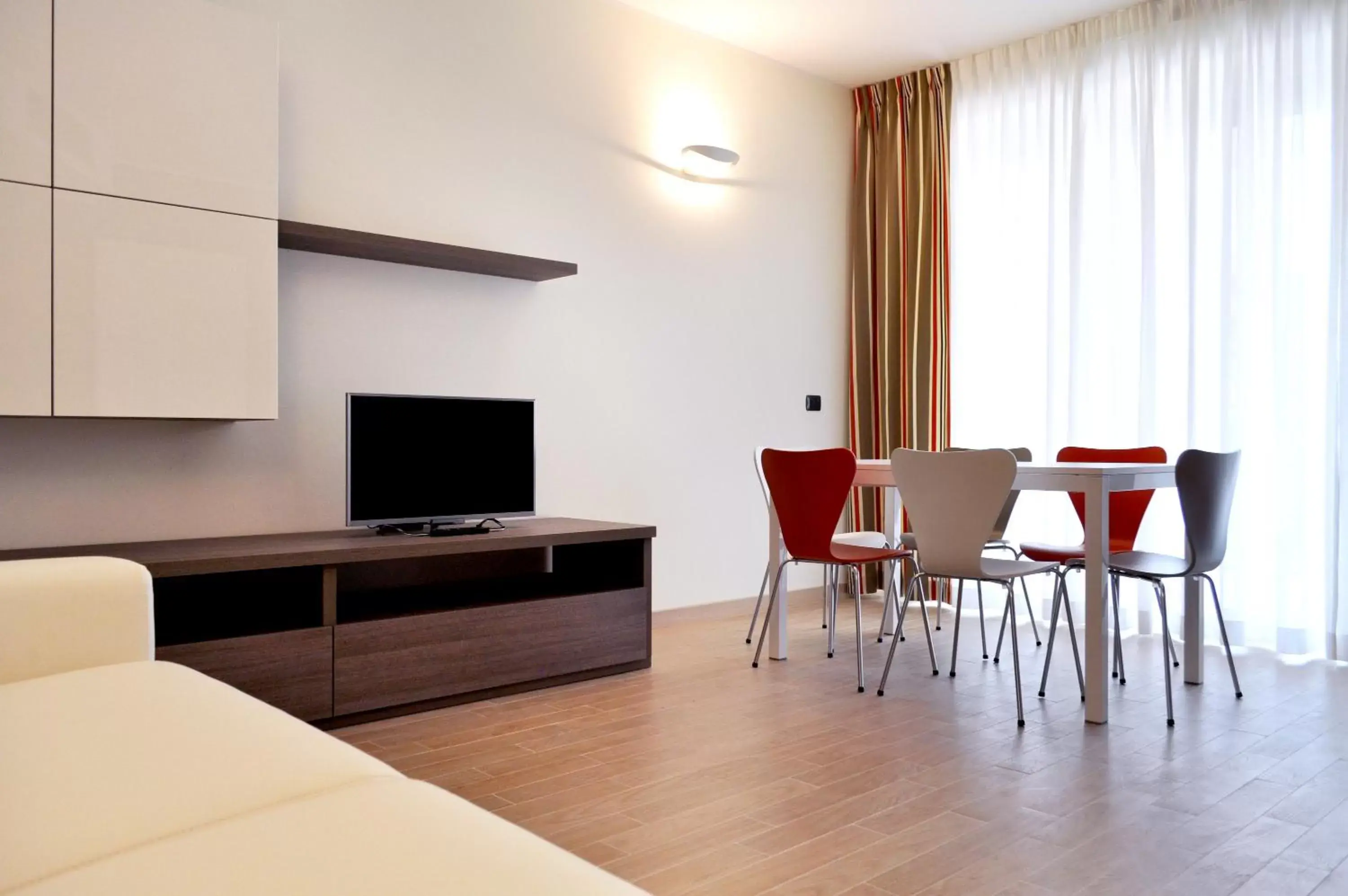 TV and multimedia, TV/Entertainment Center in BB Hotels Aparthotel Bicocca
