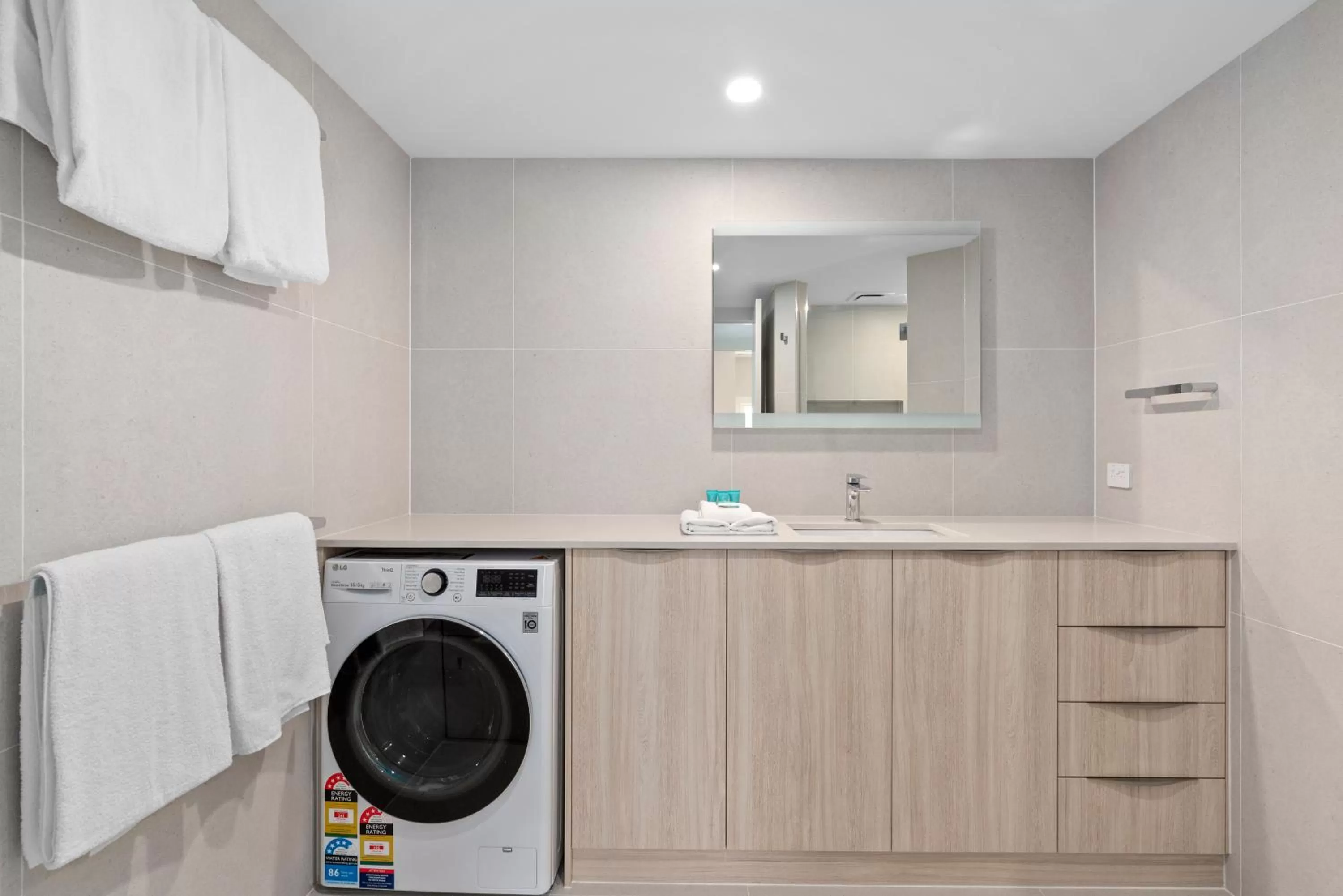 Bathroom in 84 The Spit Holiday Apartments