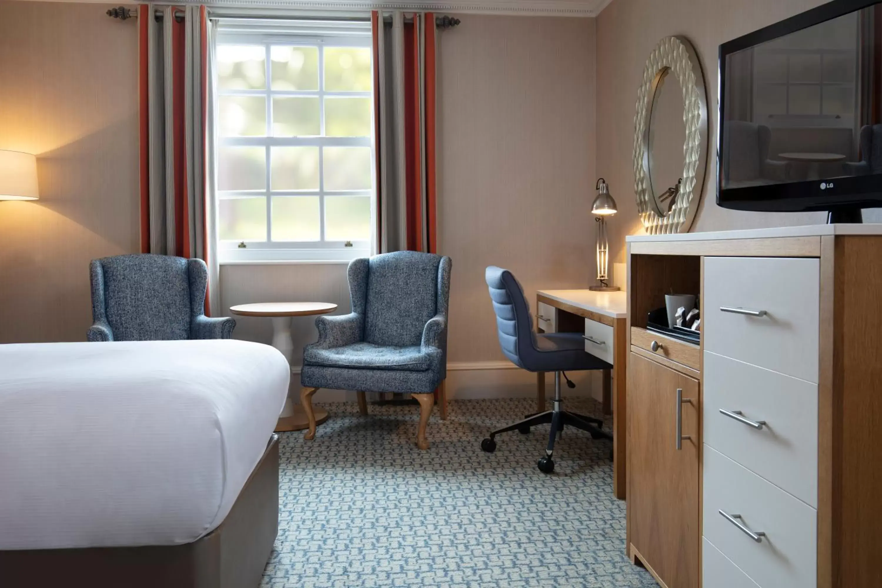 Bedroom, Seating Area in Oulton Hall Hotel, Spa & Golf Resort