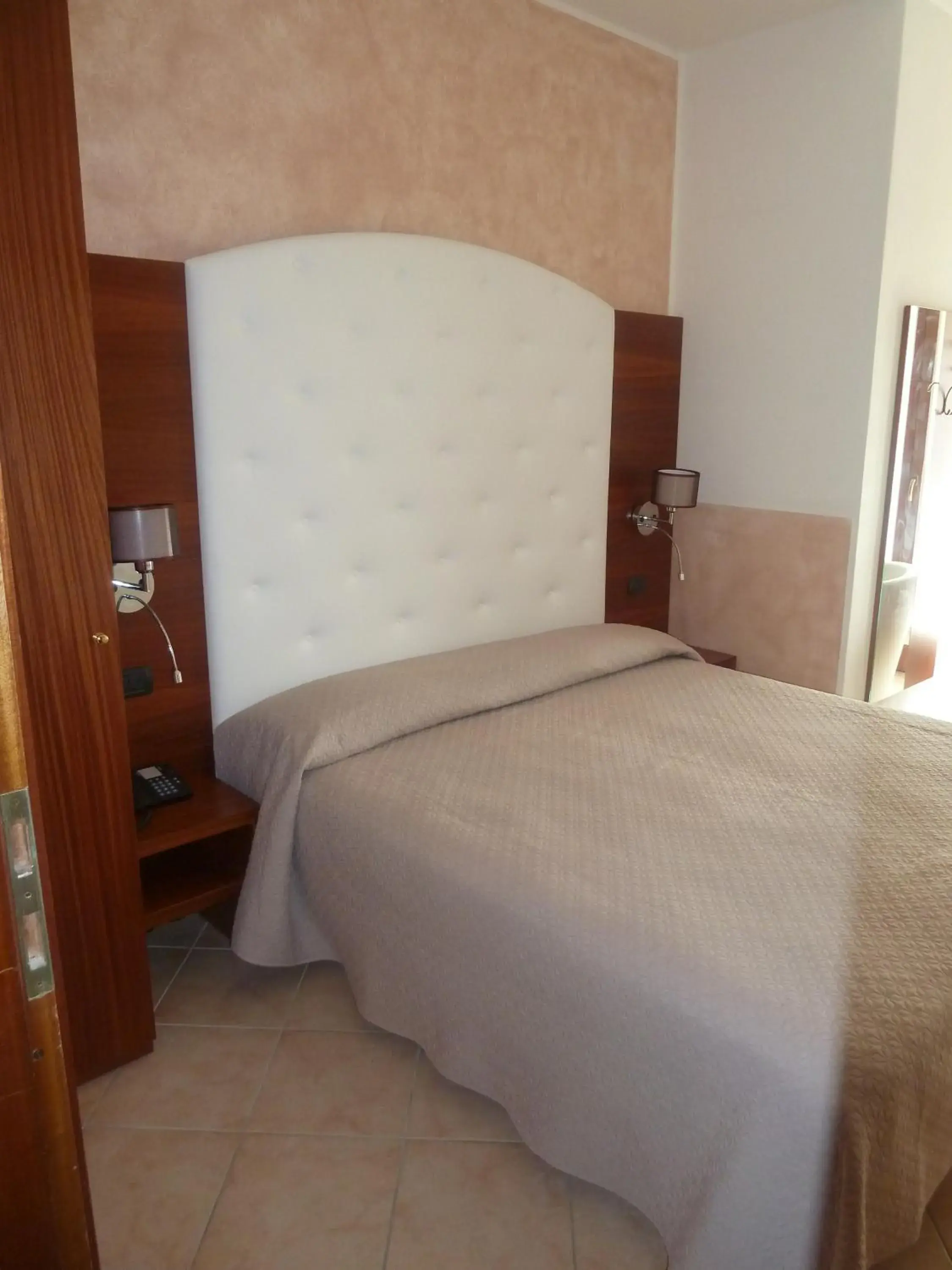 Bed in Albergo Casa Este