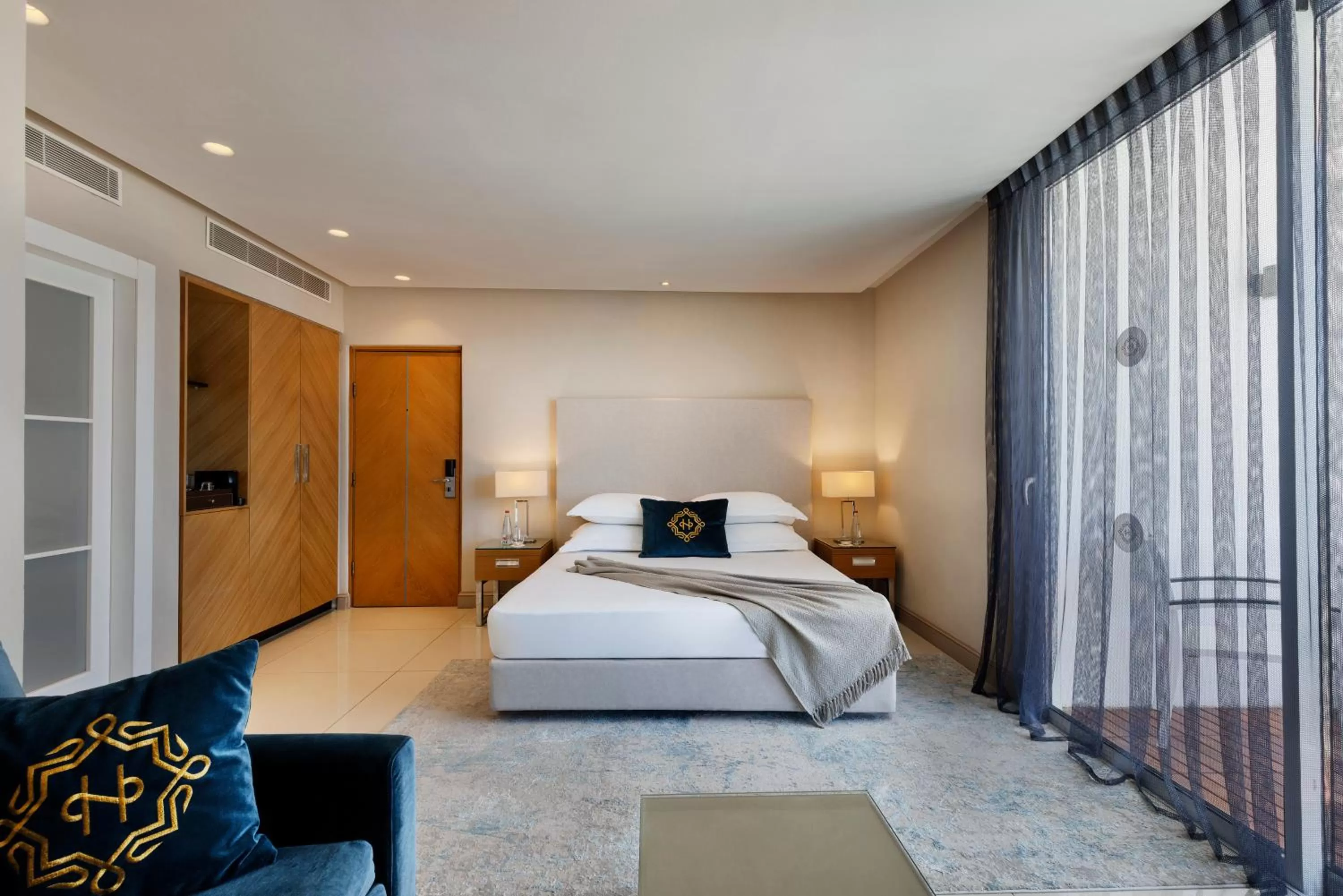 Living room, Bed in Herbert Samuel The Reef Eilat