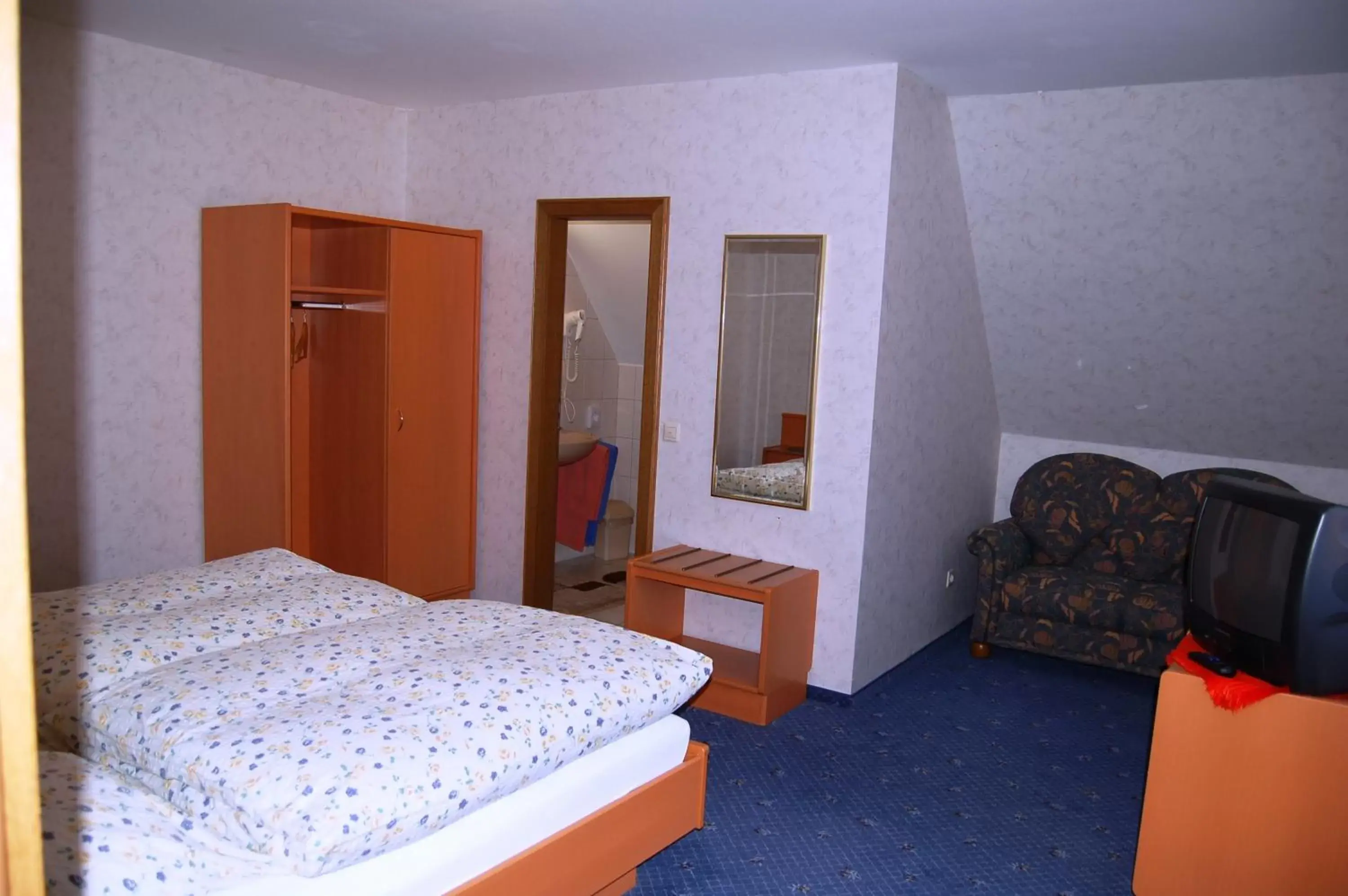 Photo of the whole room, Bed in Gasthof Waldesruh