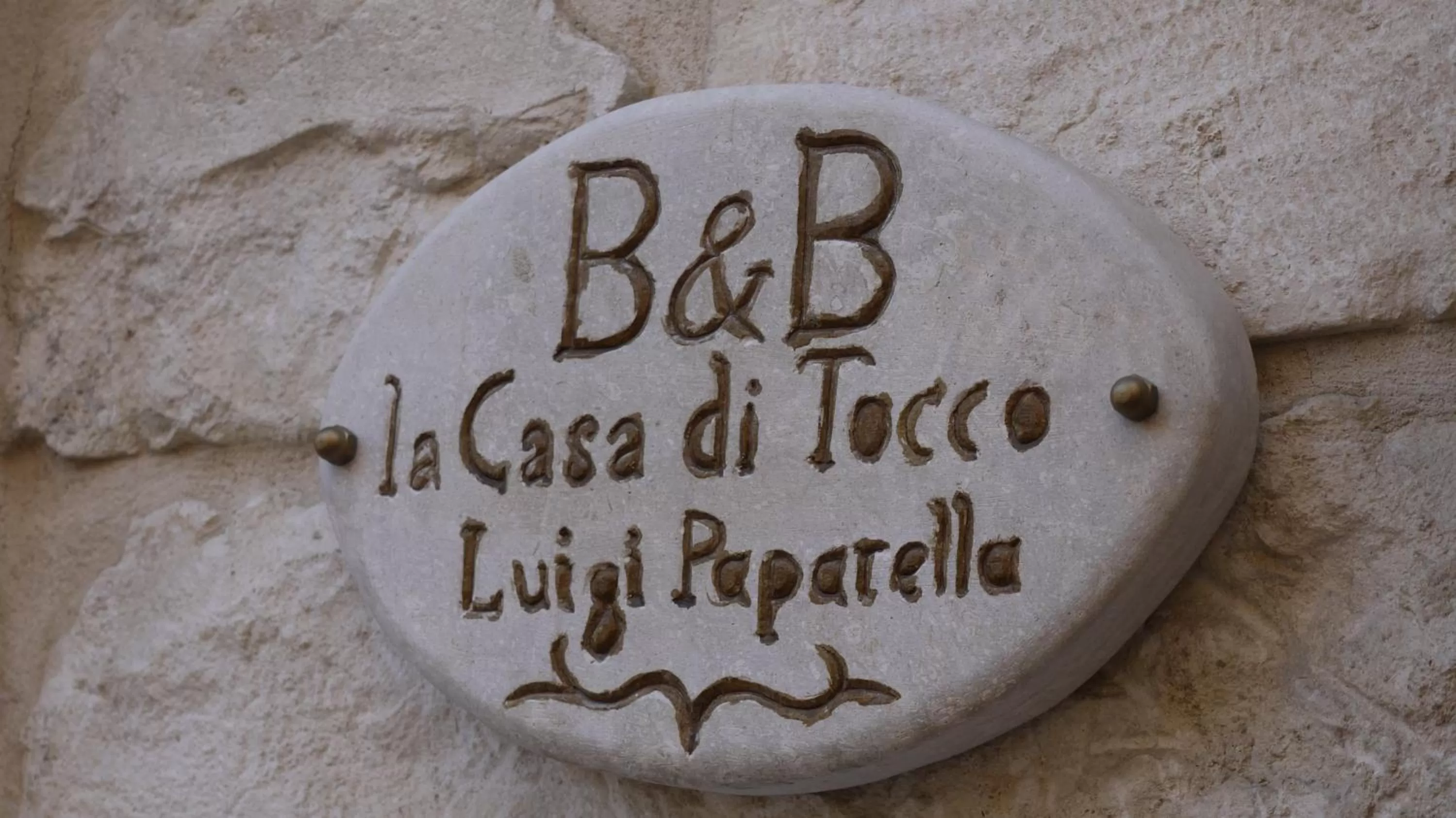 Property logo or sign in B&B La Casa Di Tocco