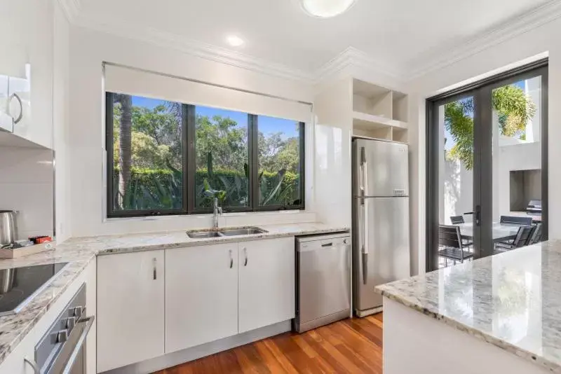 Kitchen/Kitchenette in Sand Dunes Resort Accommodation