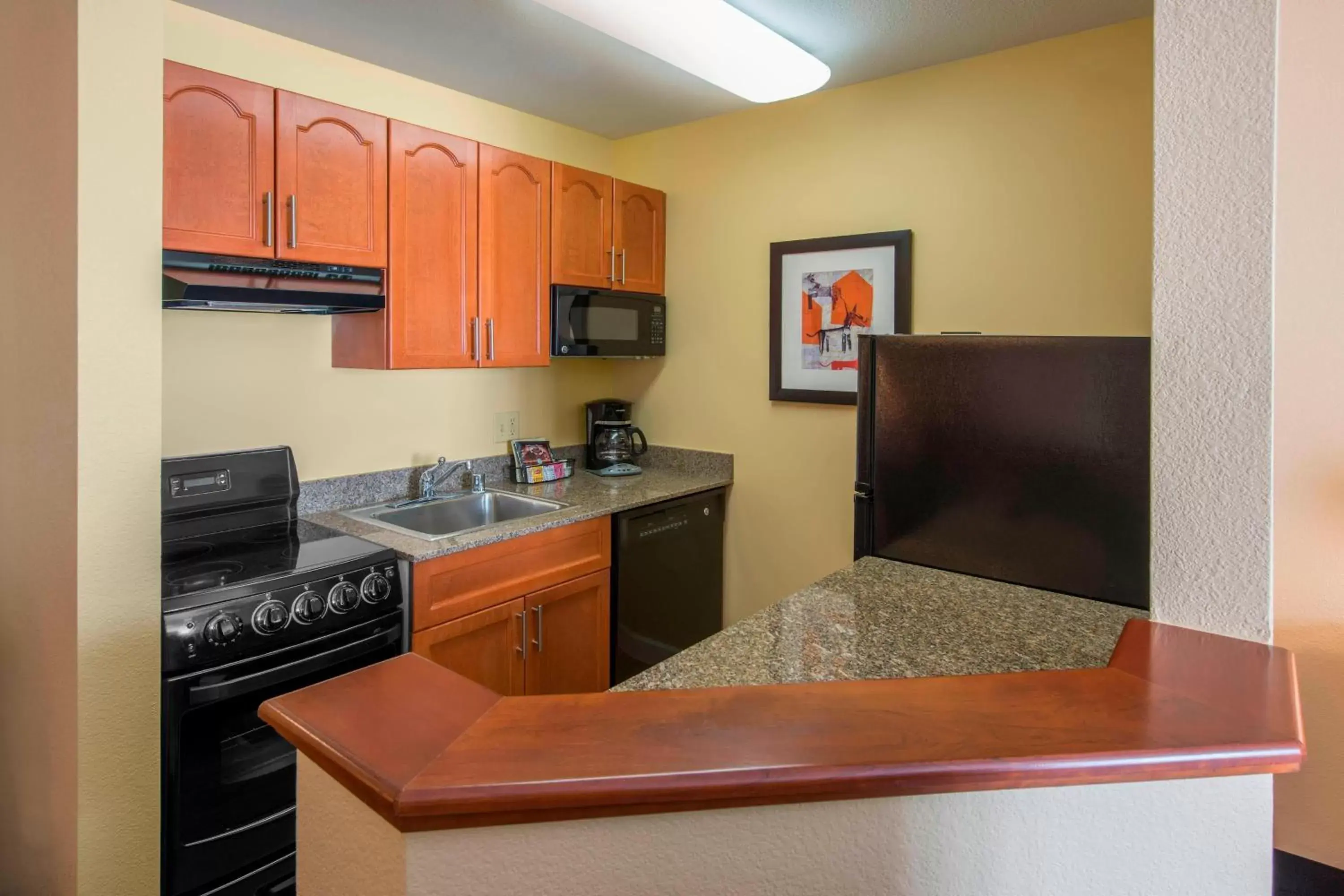 Bedroom, Kitchen/Kitchenette in TownePlace Suites Denver Tech Center