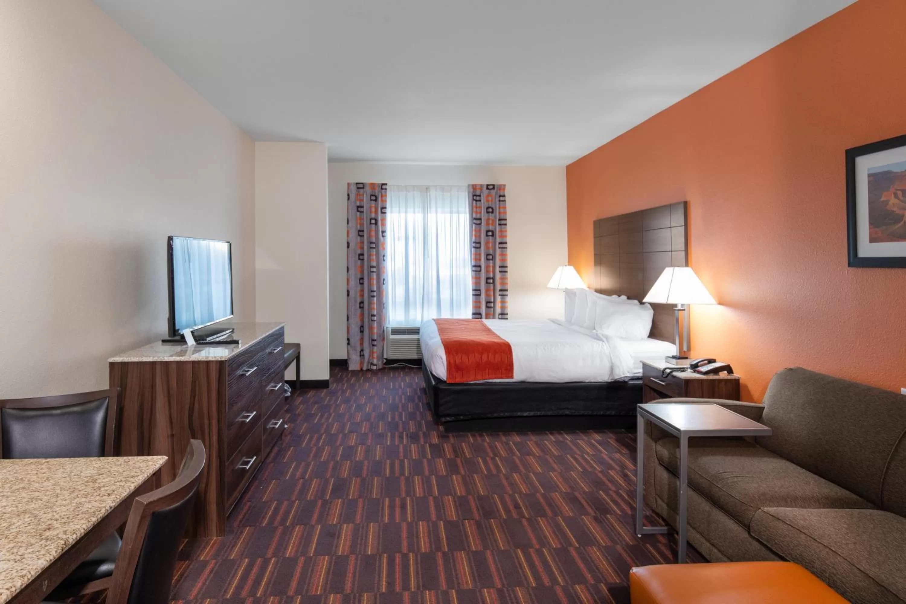 Bed in Home Away Kitchen Suites Enid