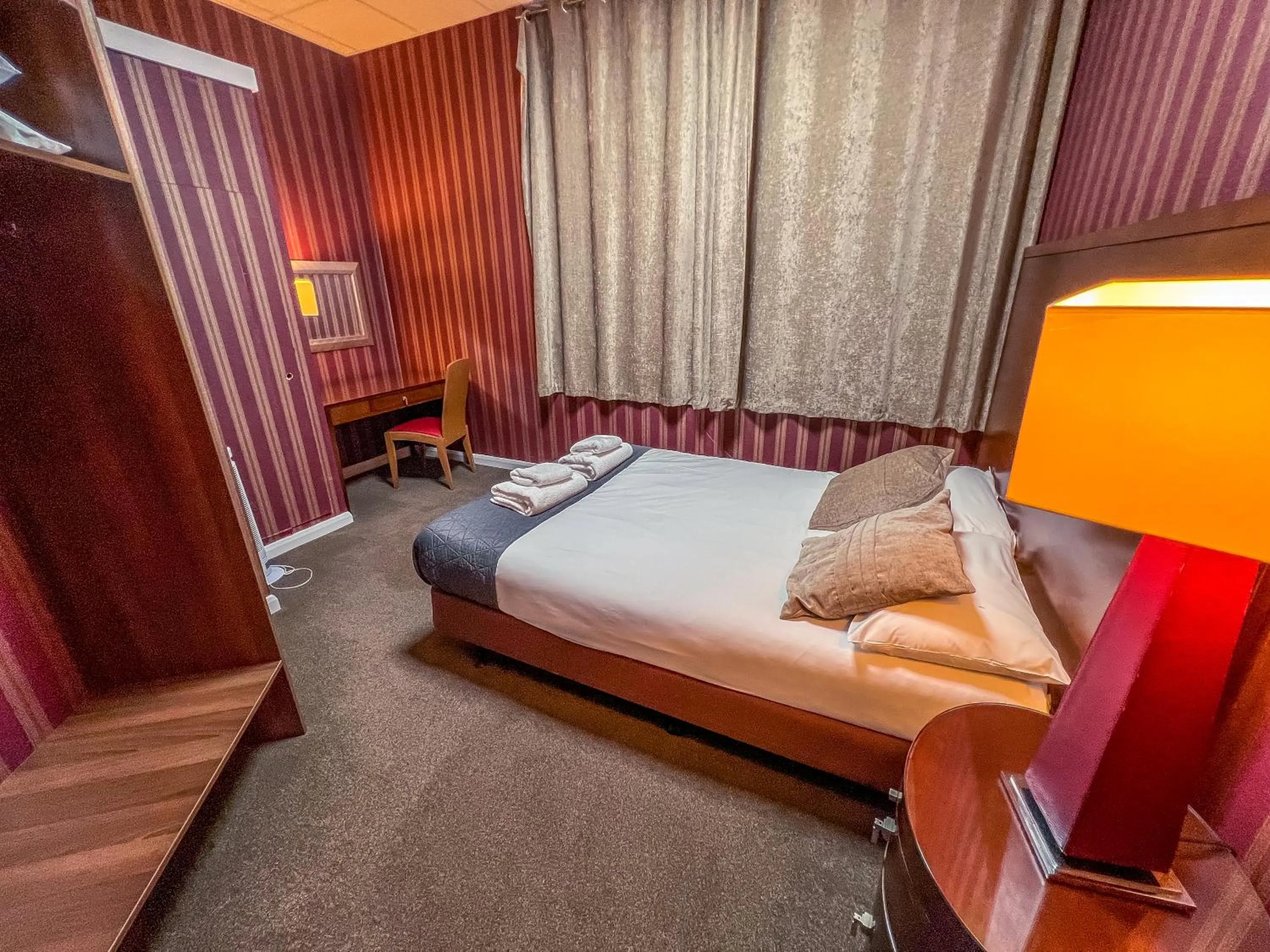 Bedroom in County Hall Apartment Hotel