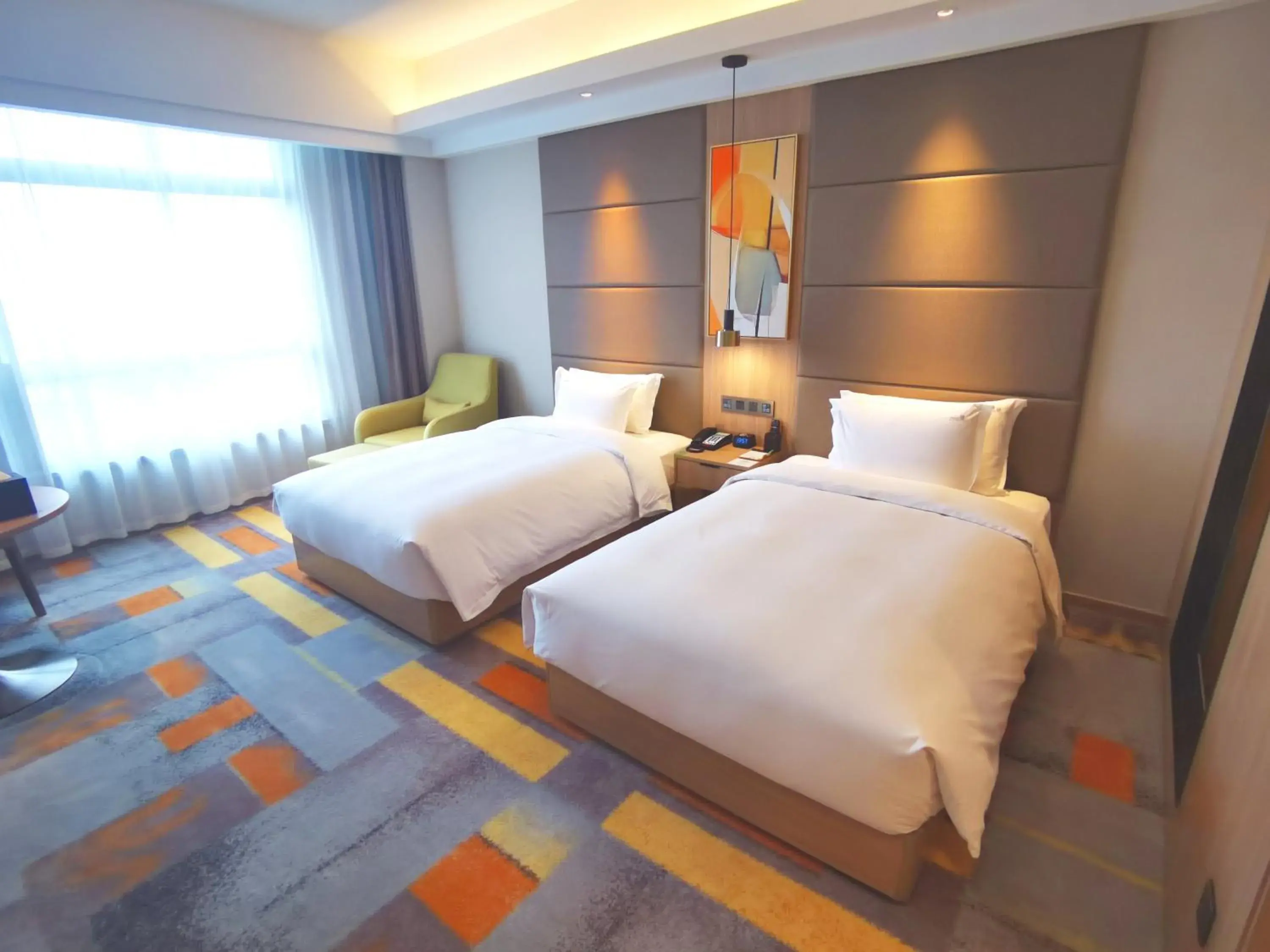 Photo of the whole room, Bed in Holiday Inn Nantong Oasis International, an IHG Hotel