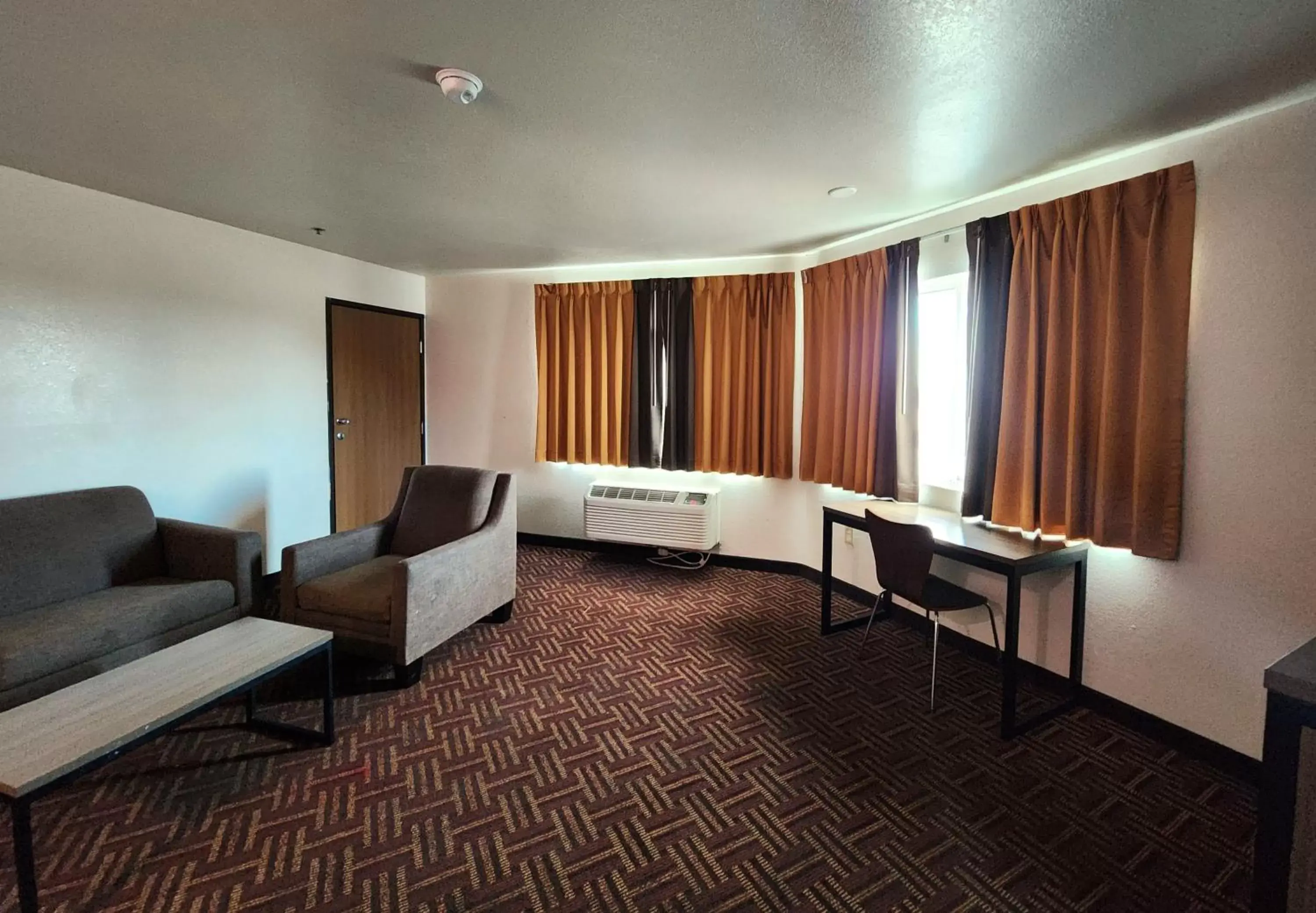 Seating area in Super 8 by Wyndham Austin North/University Area