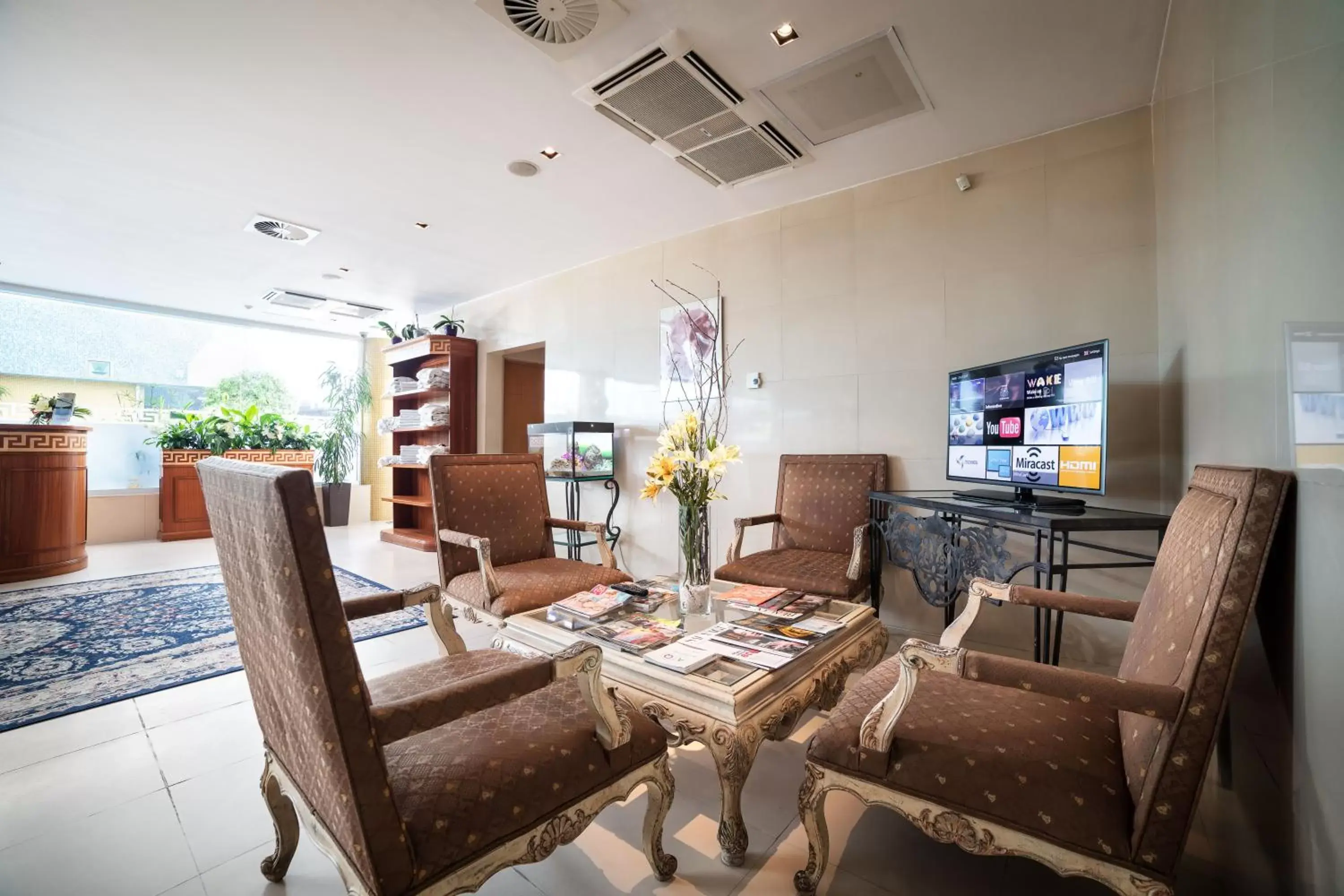 Communal lounge/ TV room, Dining Area in The Dostyk Hotel