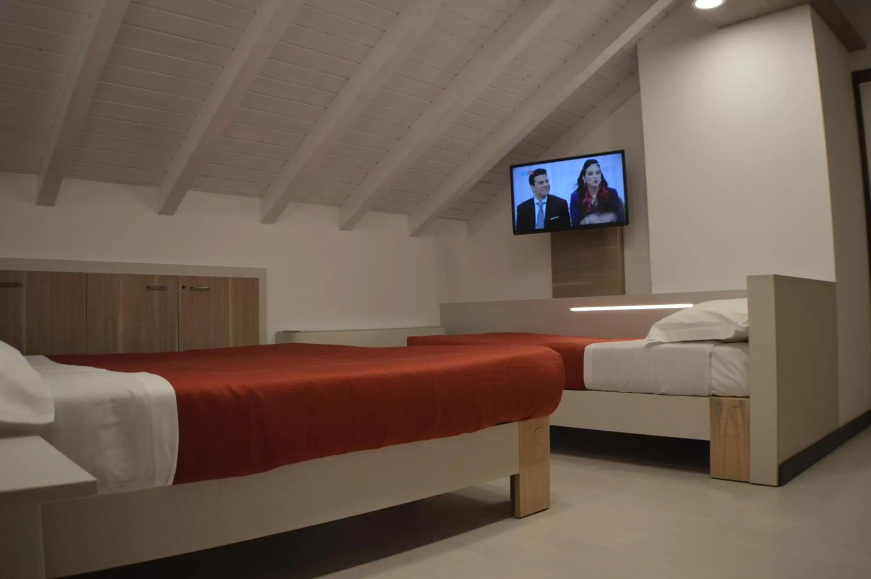 Bed in Sempione Hotel Malpensa