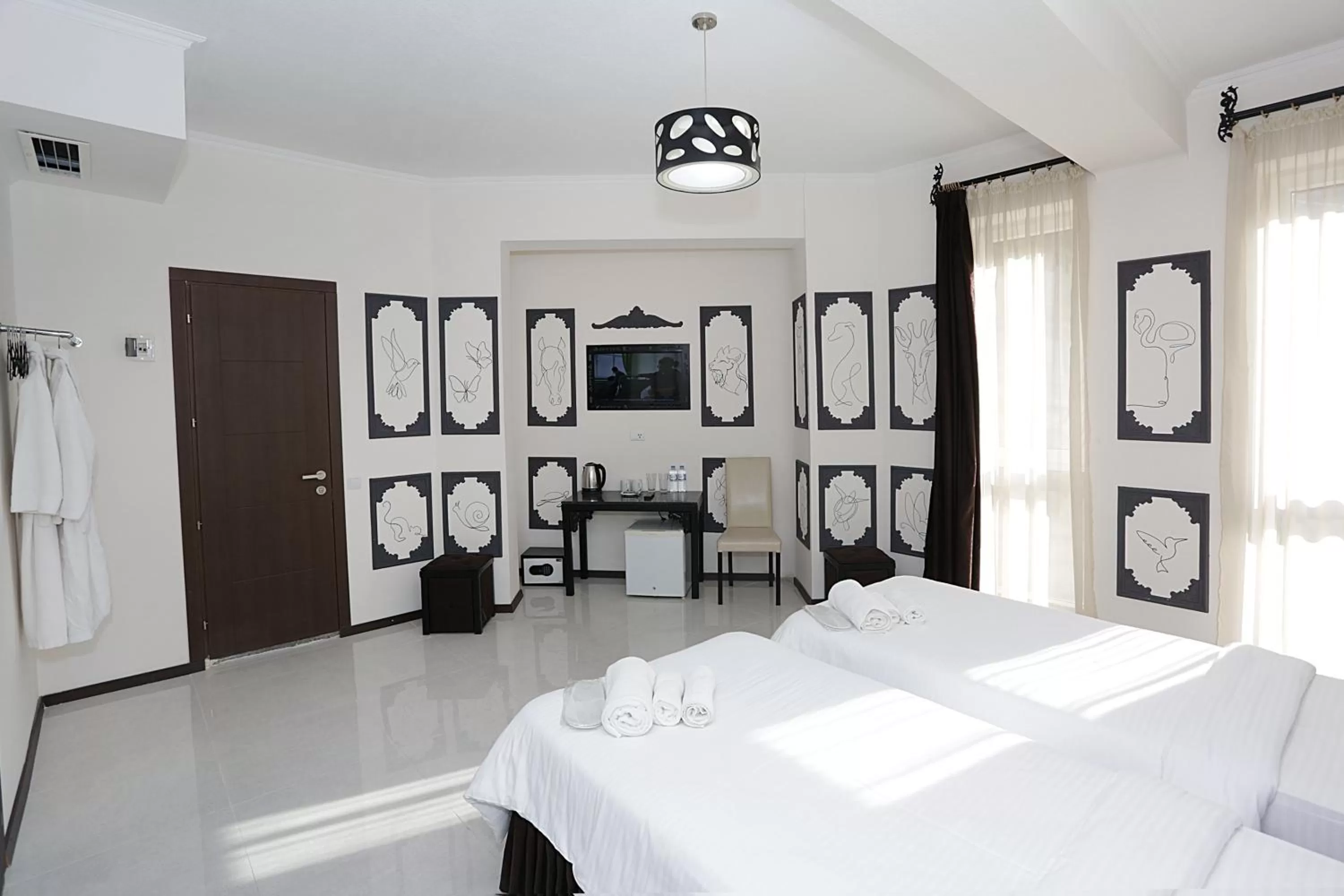 Photo of the whole room, Bed in The One Boutique