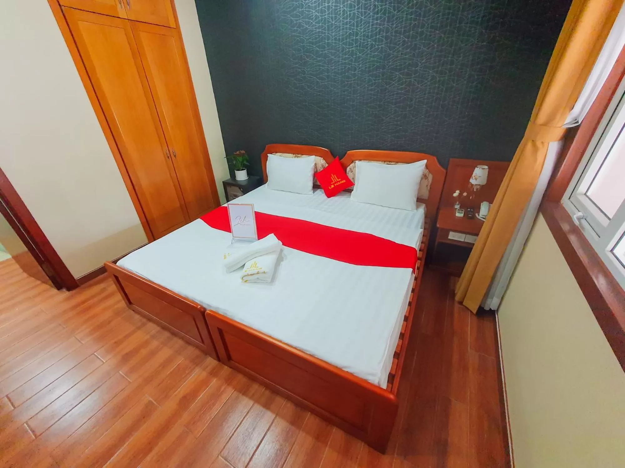 Bed in LEHA Saigon Hotel Airport