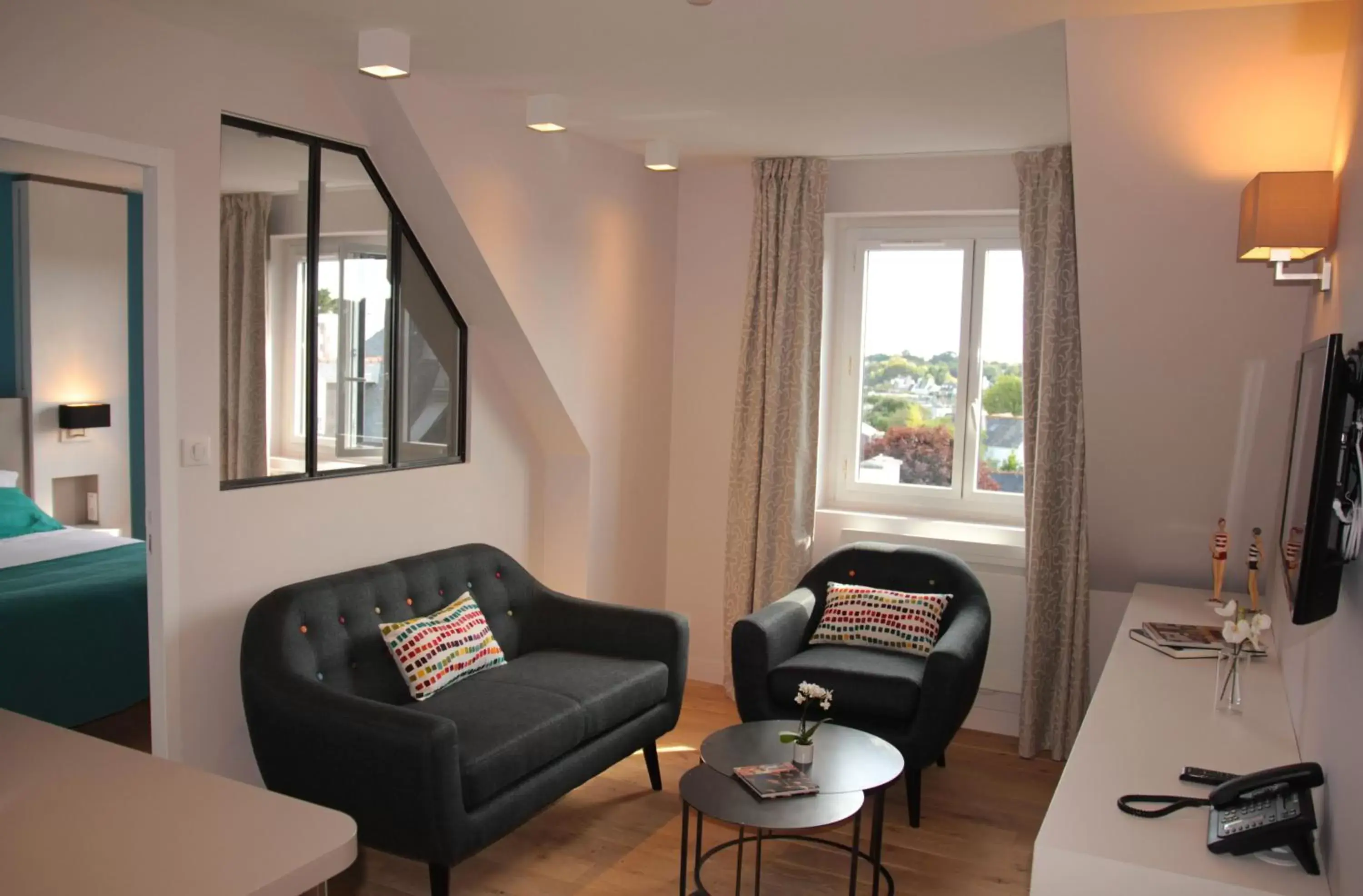 Kitchen or kitchenette, Seating Area in Cit'Hotel Le Cornouaille Hotel