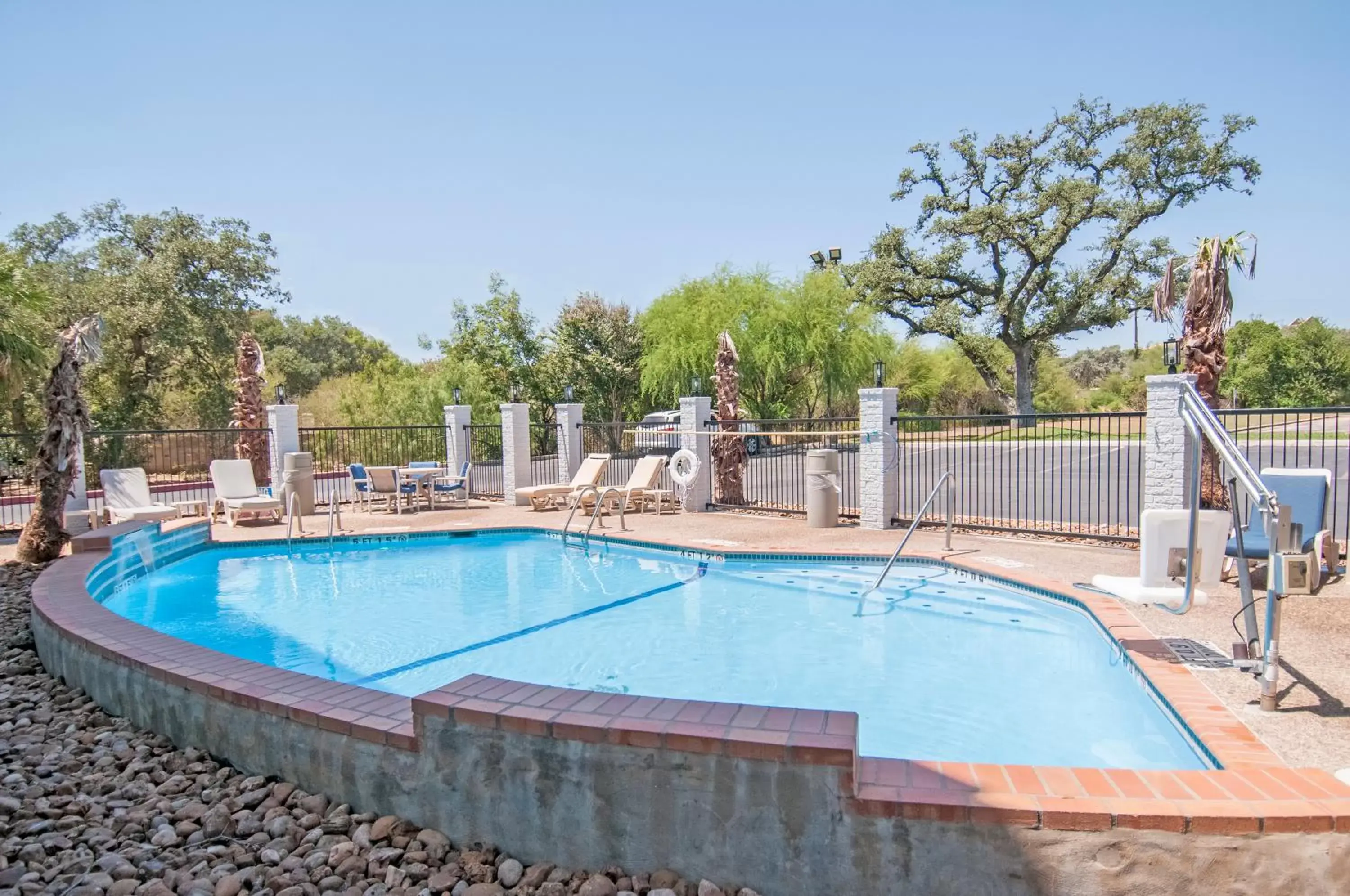 Swimming Pool in Days Inn by Wyndham Suites San Antonio North/Stone Oak