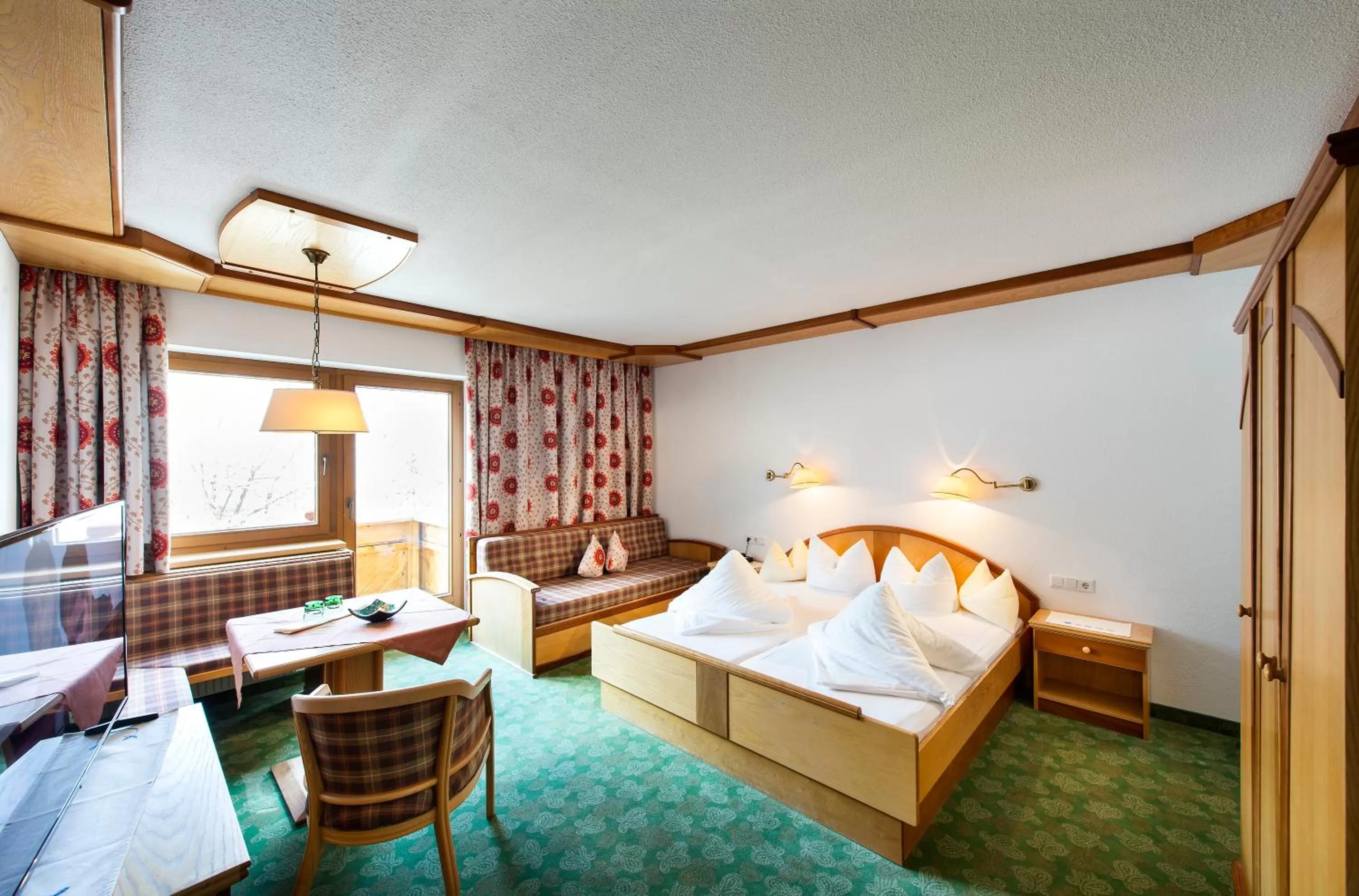 Photo of the whole room, Bed in Huber Hotel Tramserhof