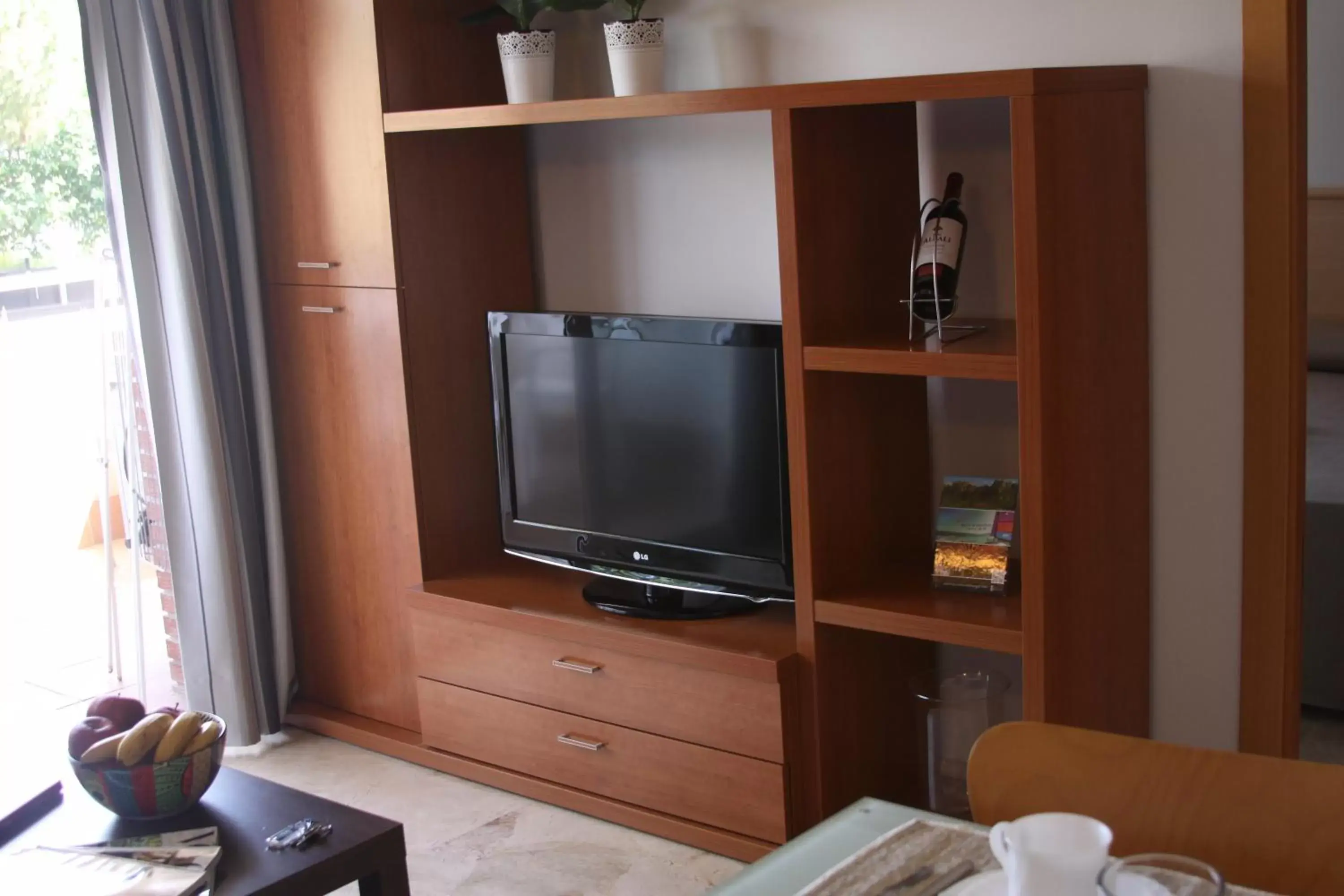 TV and multimedia, TV/Entertainment Center in Aparthotel Marsol