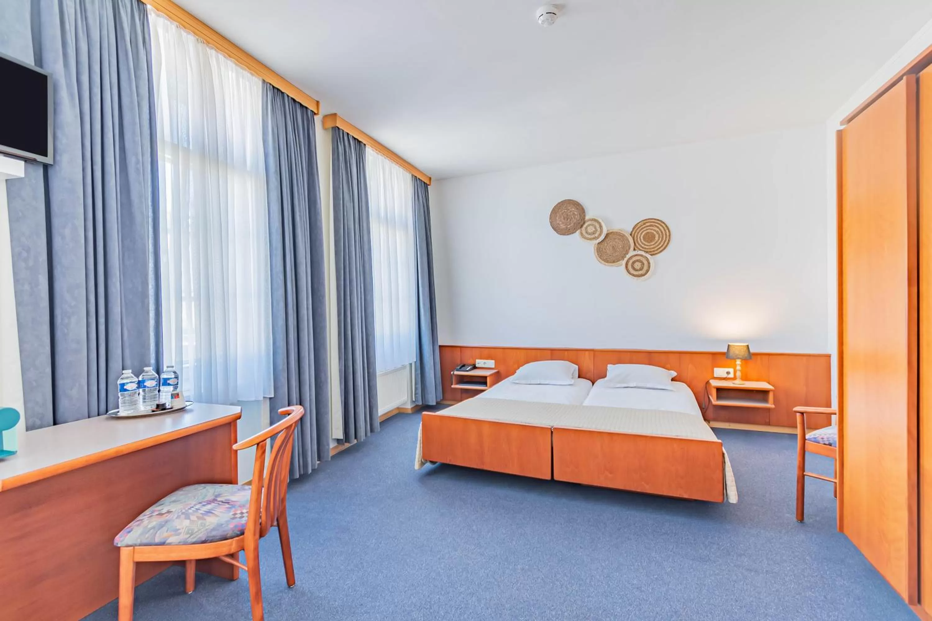 Bed in Hôtel Le Petit Poète