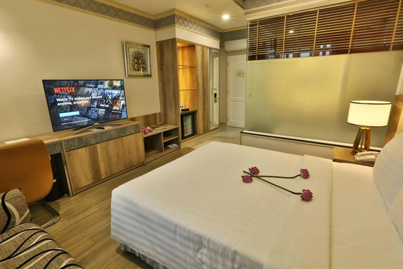 Bedroom, TV/Entertainment Center in Lotus Saigon Hotel