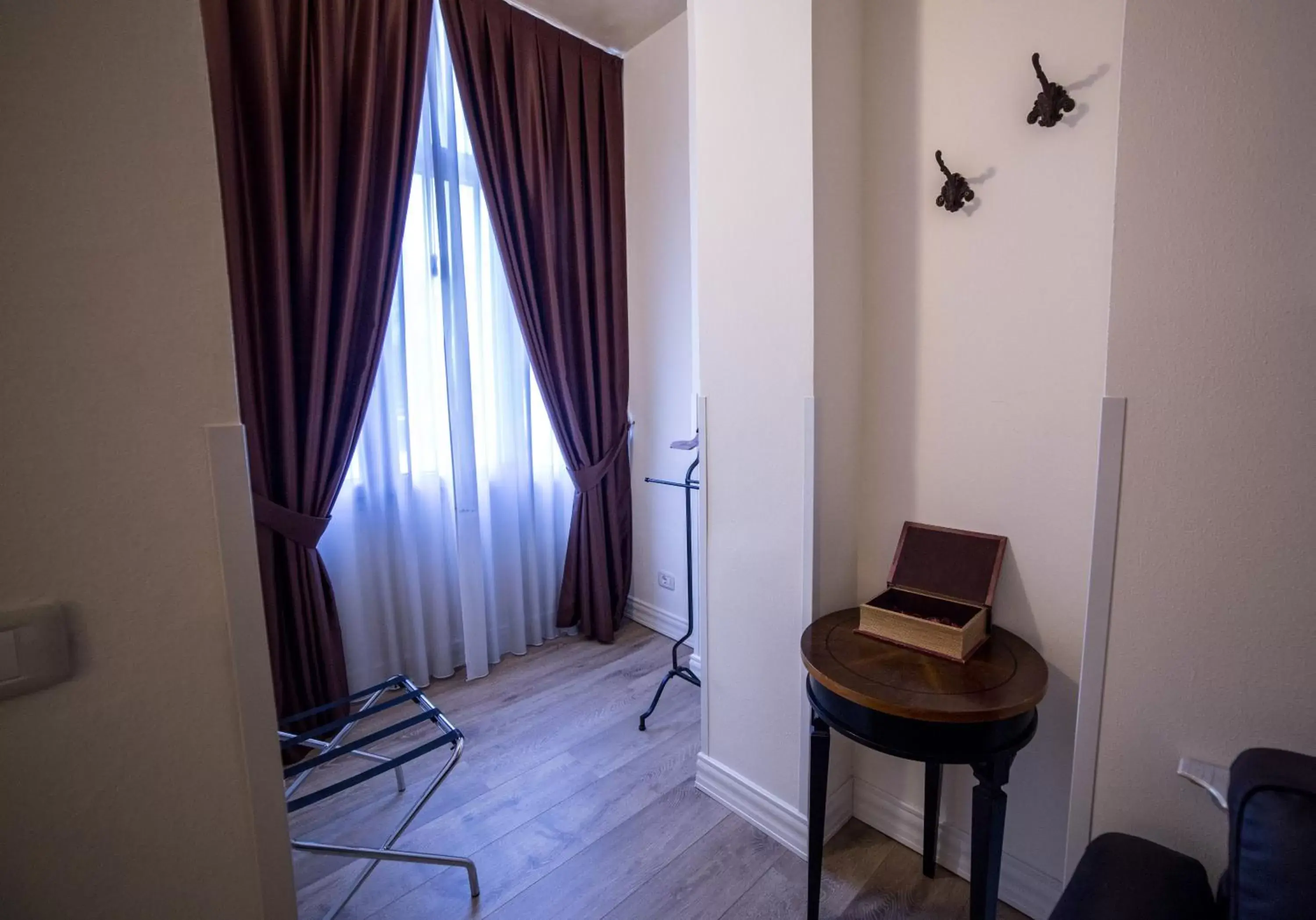 Bedroom, Seating Area in Hotel Patavium