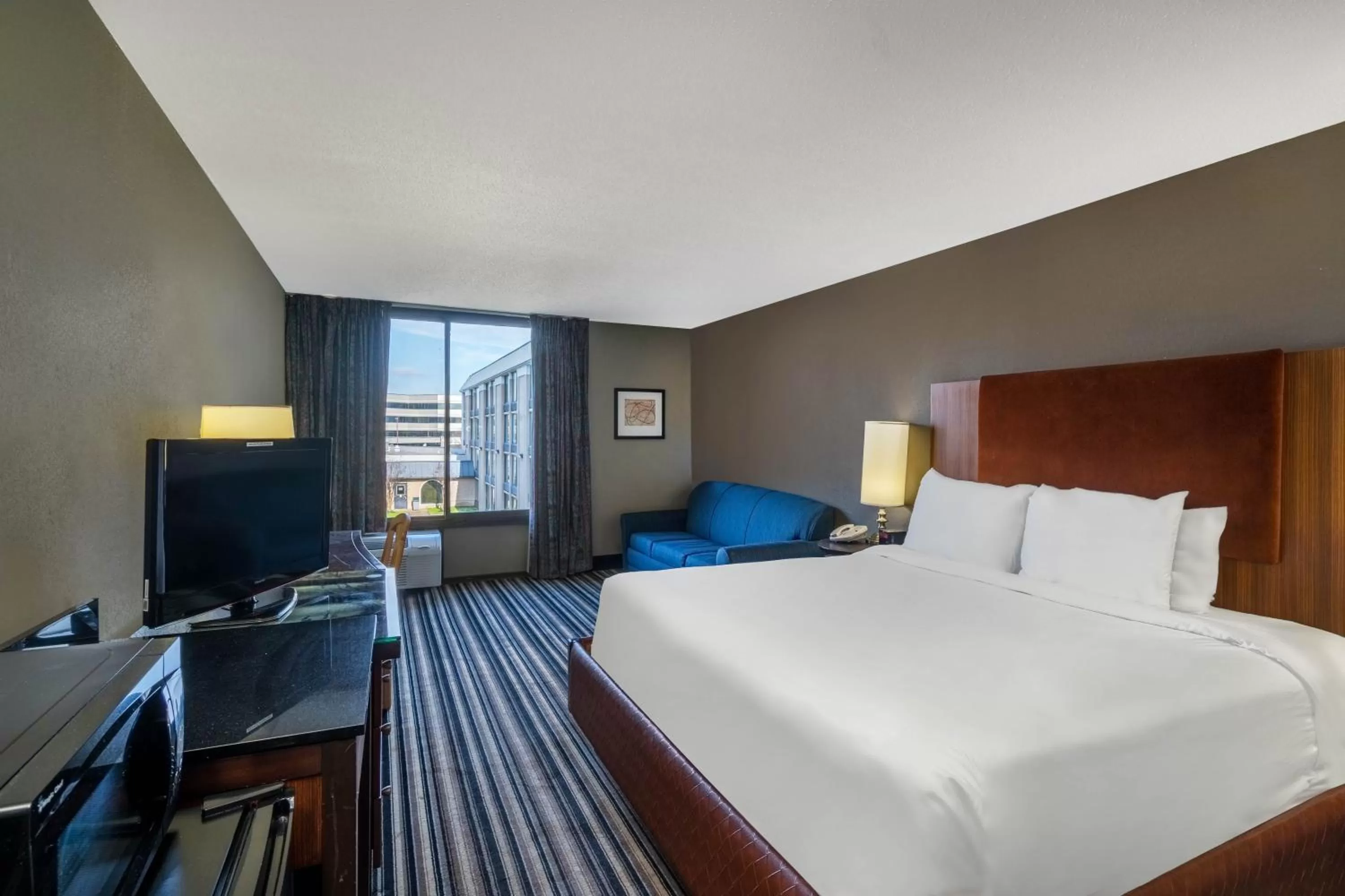 Bedroom in Travelodge by Wyndham Memphis Airport/Graceland