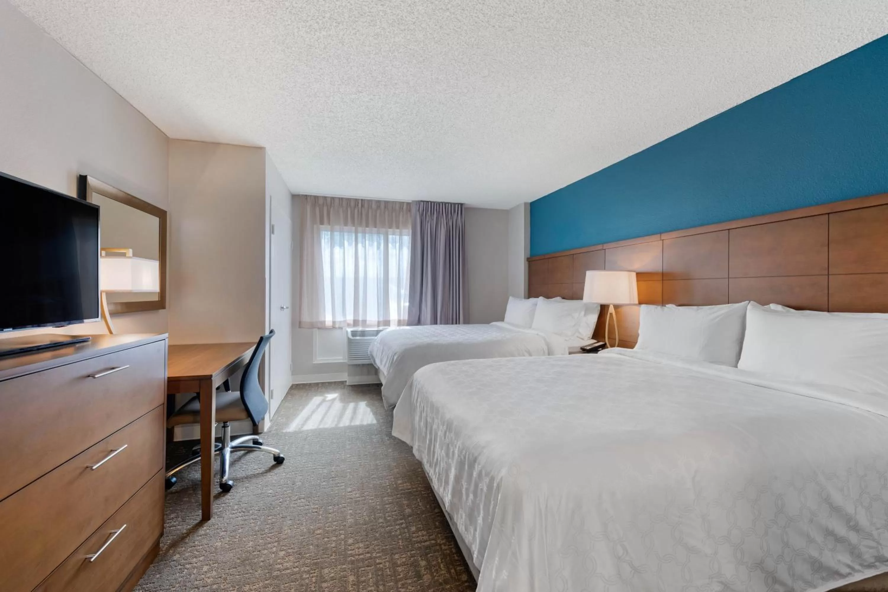 Photo of the whole room, Bed in Staybridge Suites Orlando Royale Parc Suites by IHG