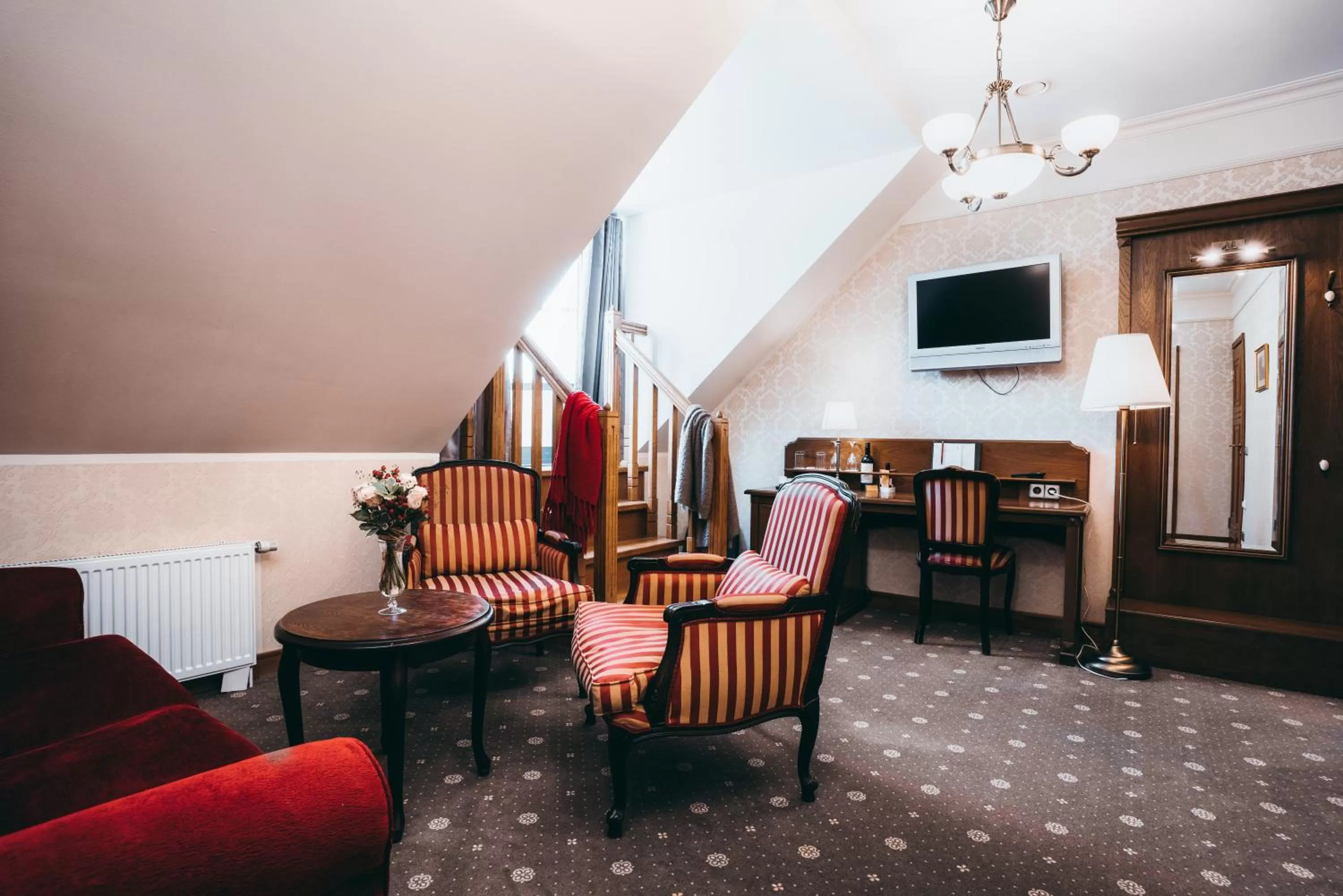 Communal lounge/ TV room in Arensburg Boutique Hotel & Spa