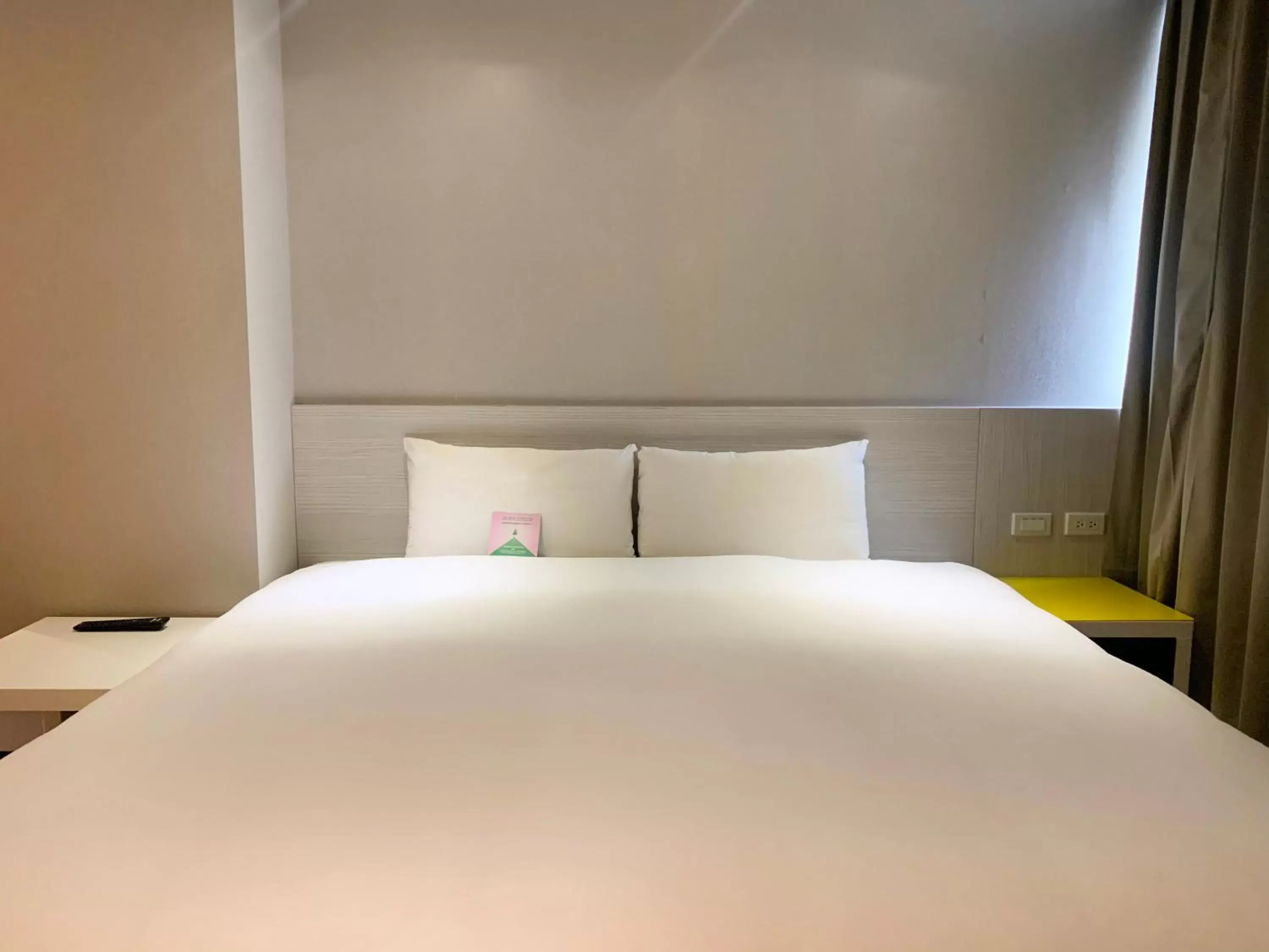 Bed in Wholesome Hotel